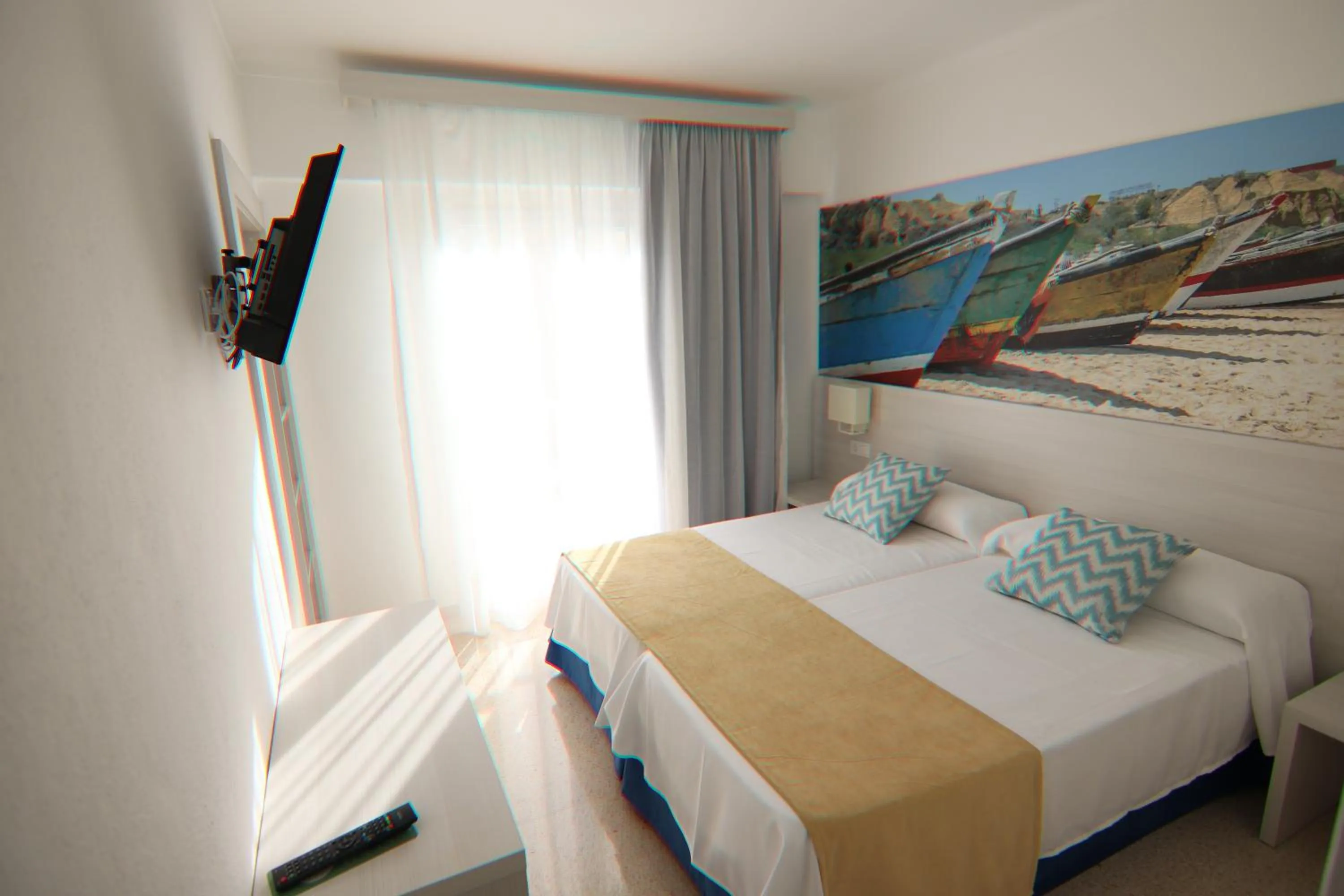 Photo of the whole room, Bed in Hostal Cala Ratjada