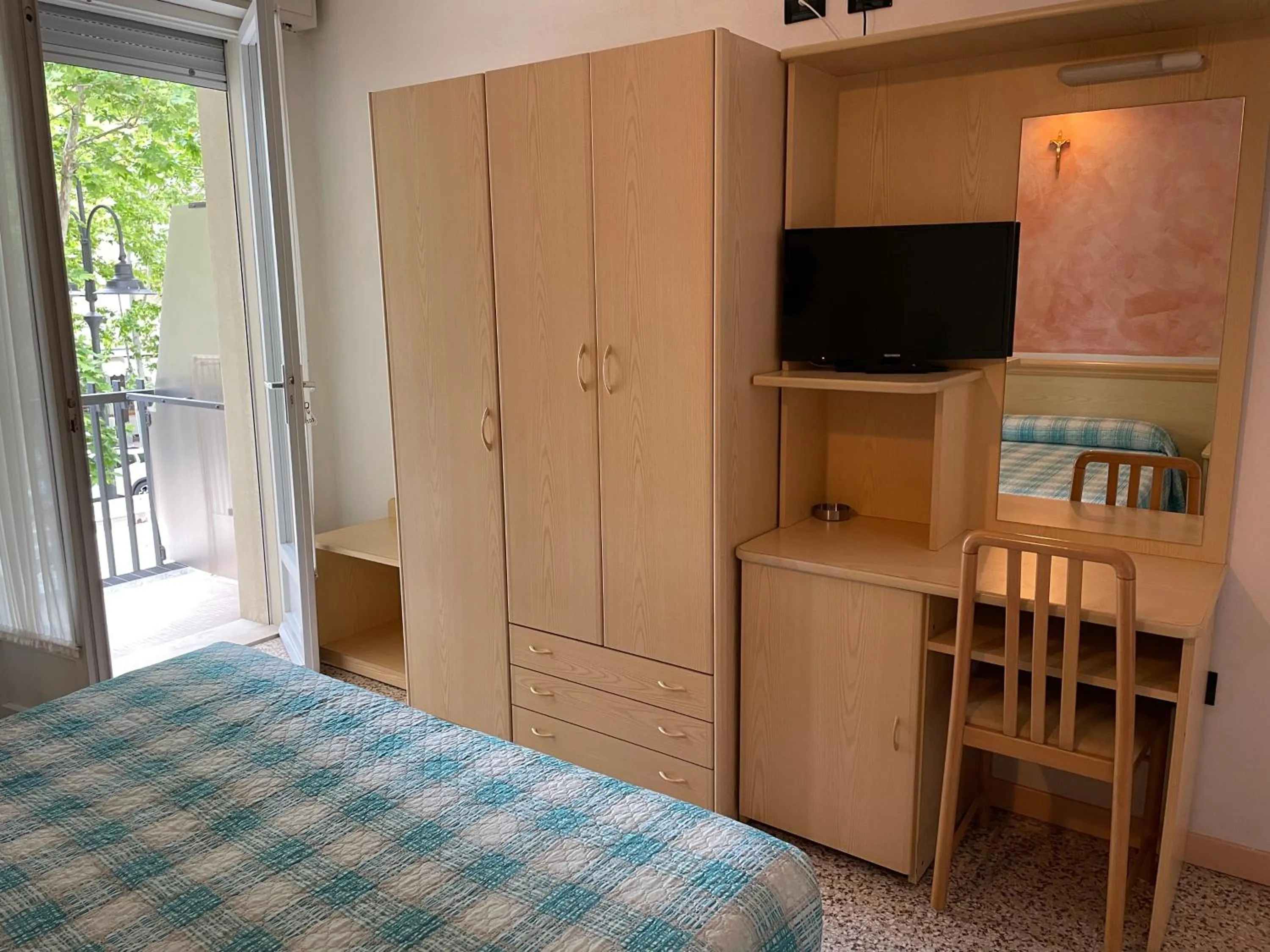 Bed in Piccolo Hotel