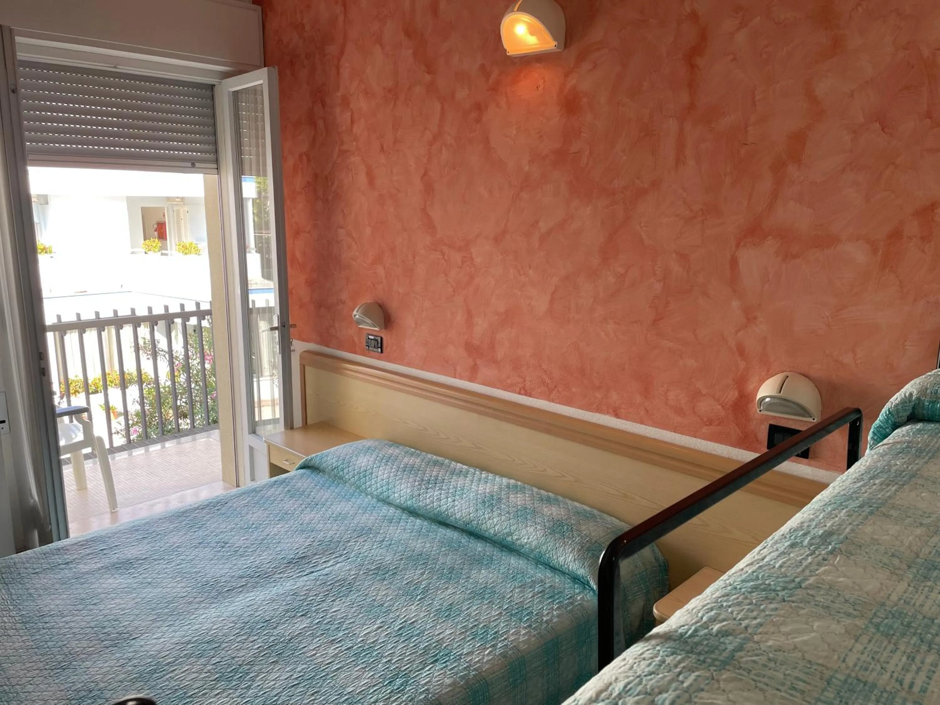 Bed in Piccolo Hotel