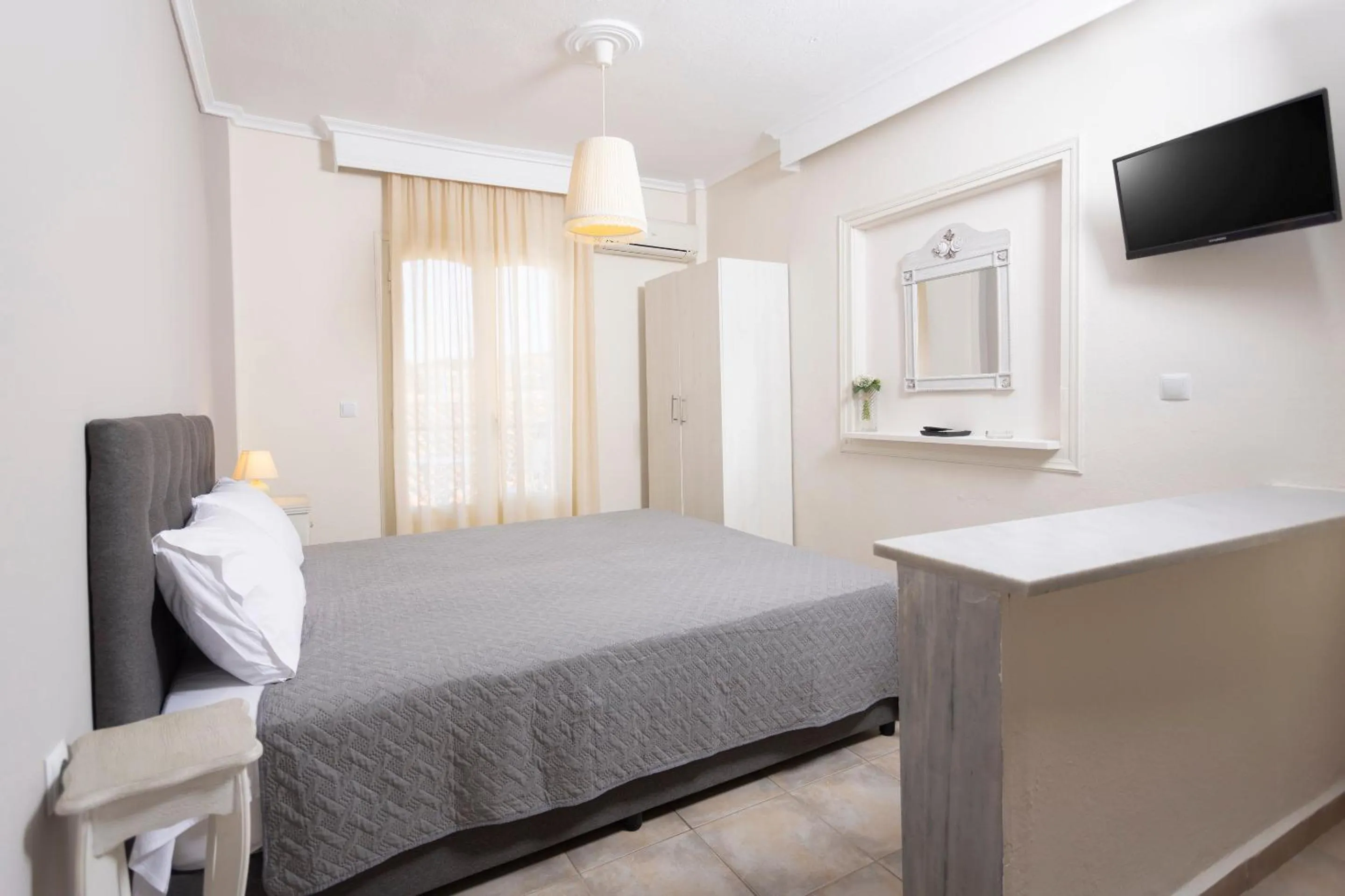 Bed in Anatoli Apartments Polichrono