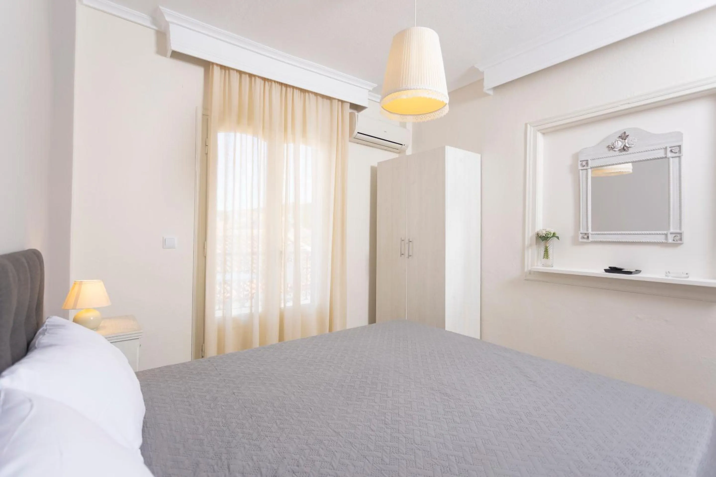 Bed in Anatoli Apartments Polichrono