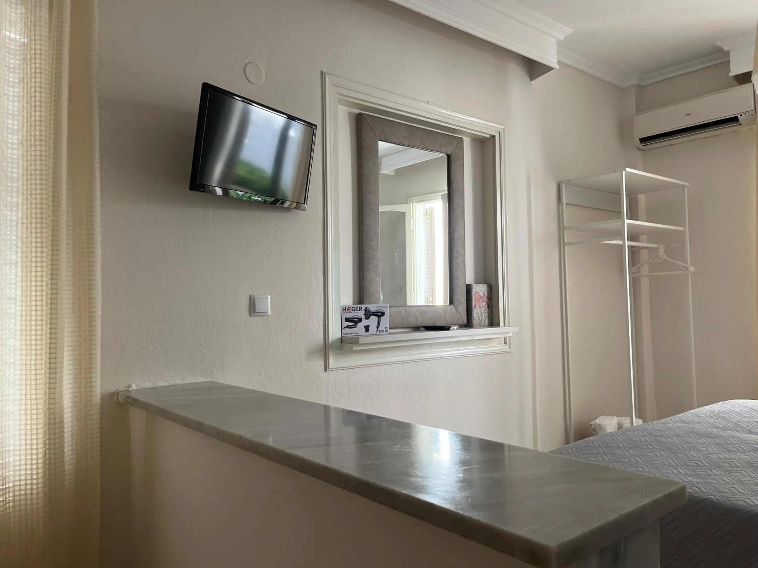 Bed in Anatoli Apartments Polichrono