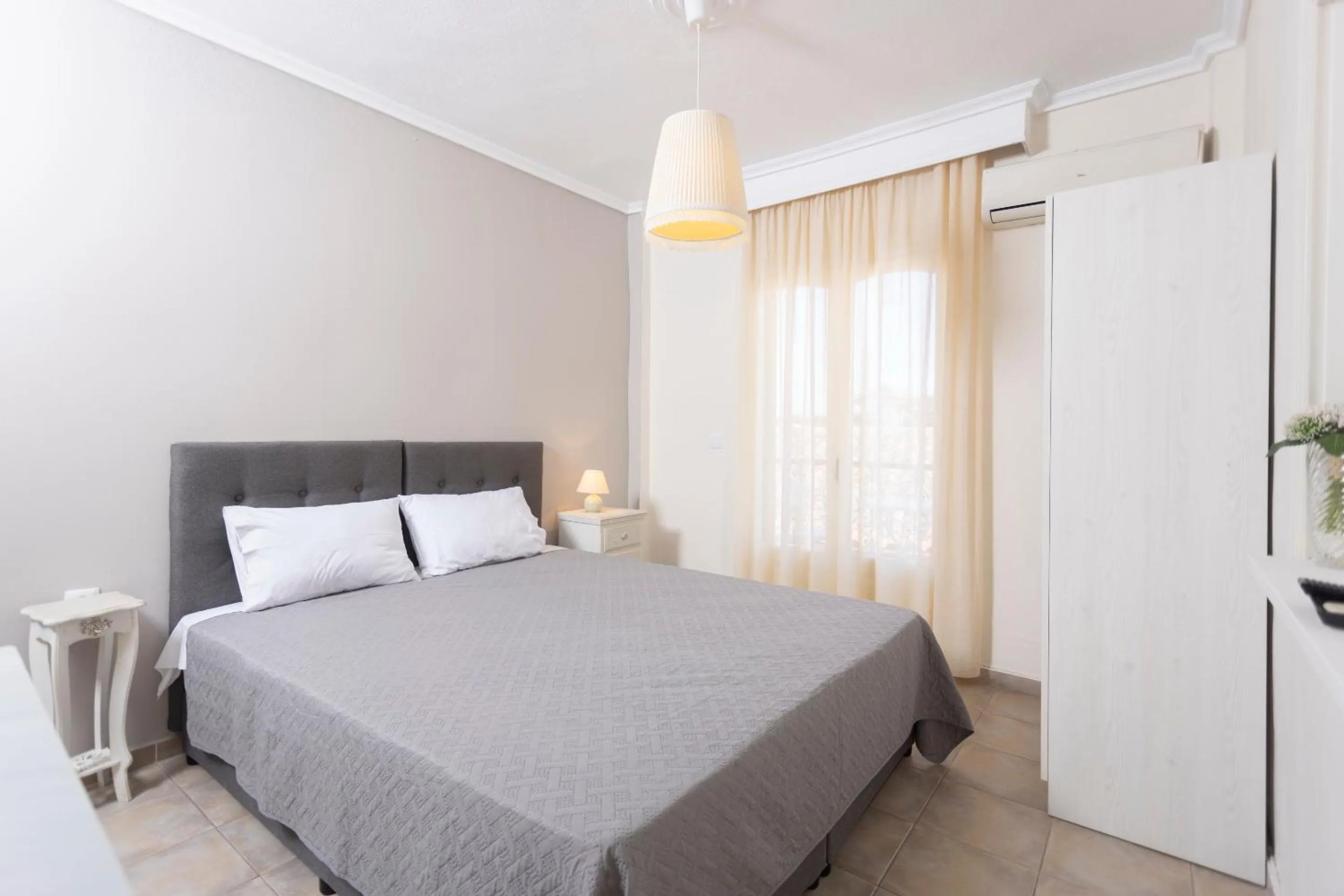 Bed in Anatoli Apartments Polichrono