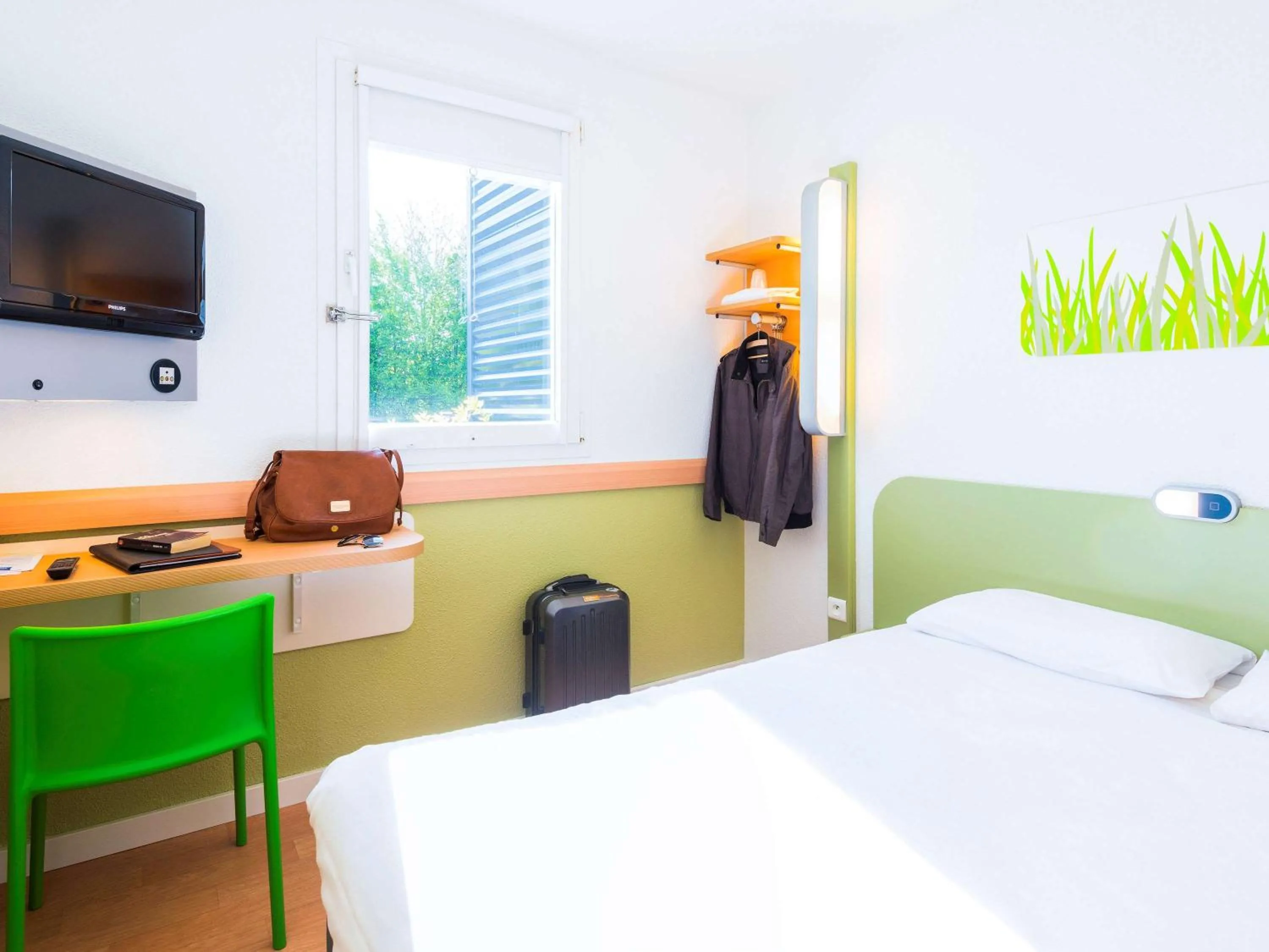 Photo of the whole room, Bed in ibis budget Rennes Route de Saint Malo