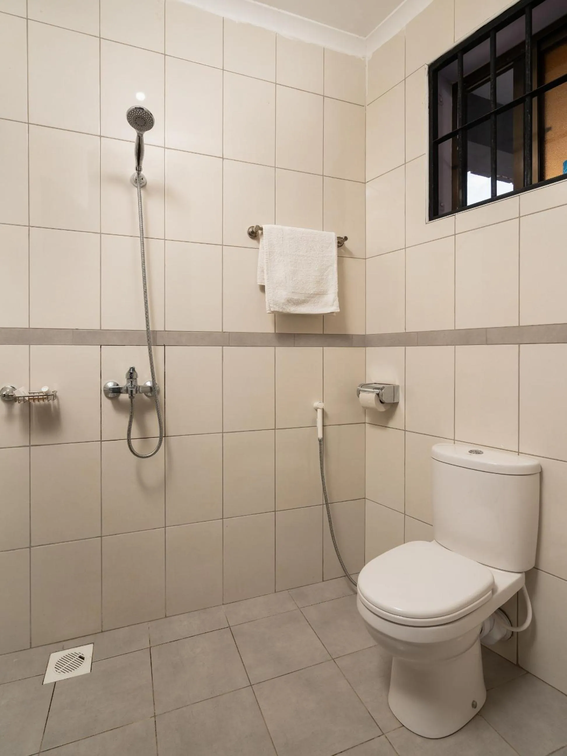 Shower in Mrimba Palm Hotel