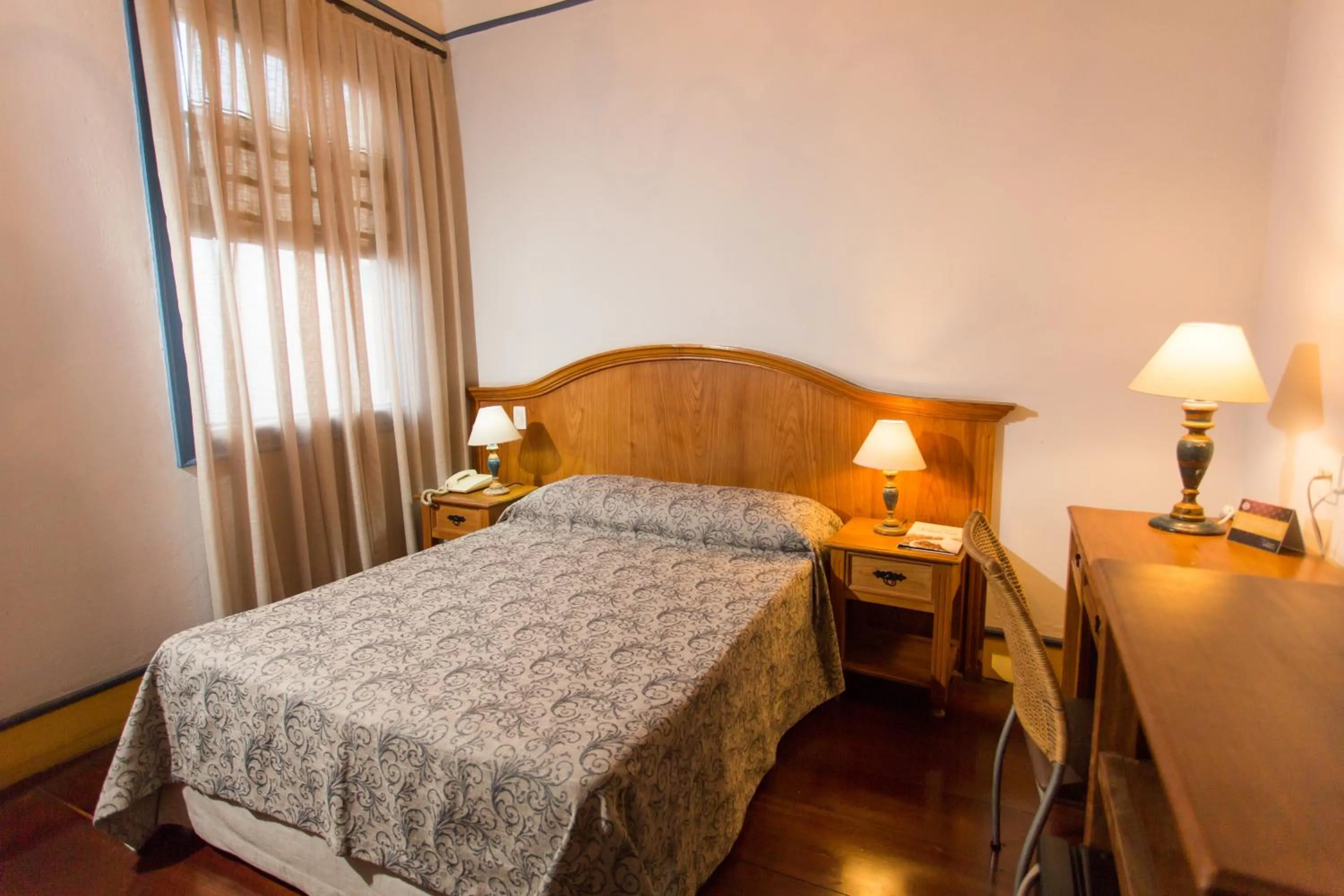 Bed in Pousada Solar da Ópera