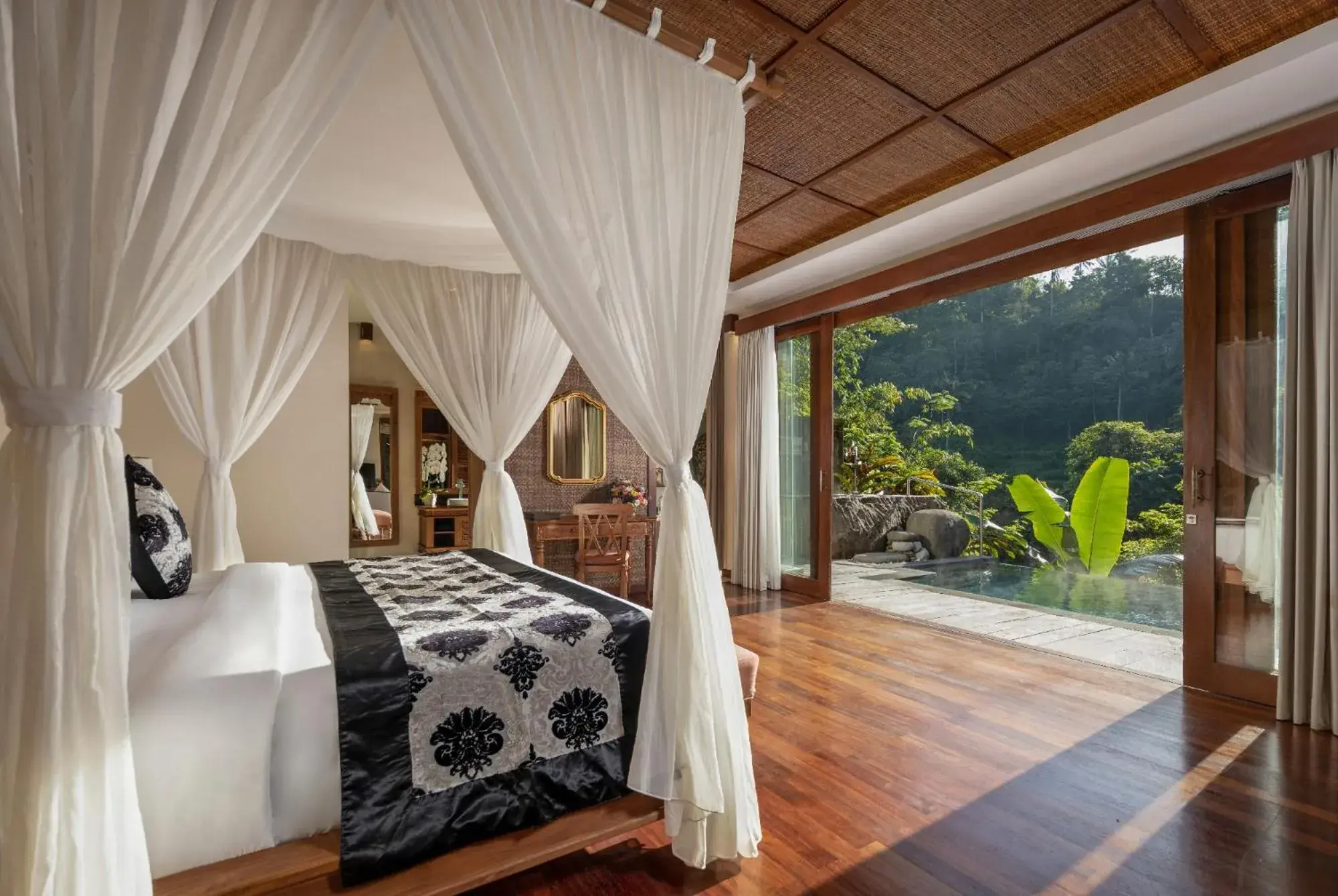 Bed in The Kayon Jungle Resort