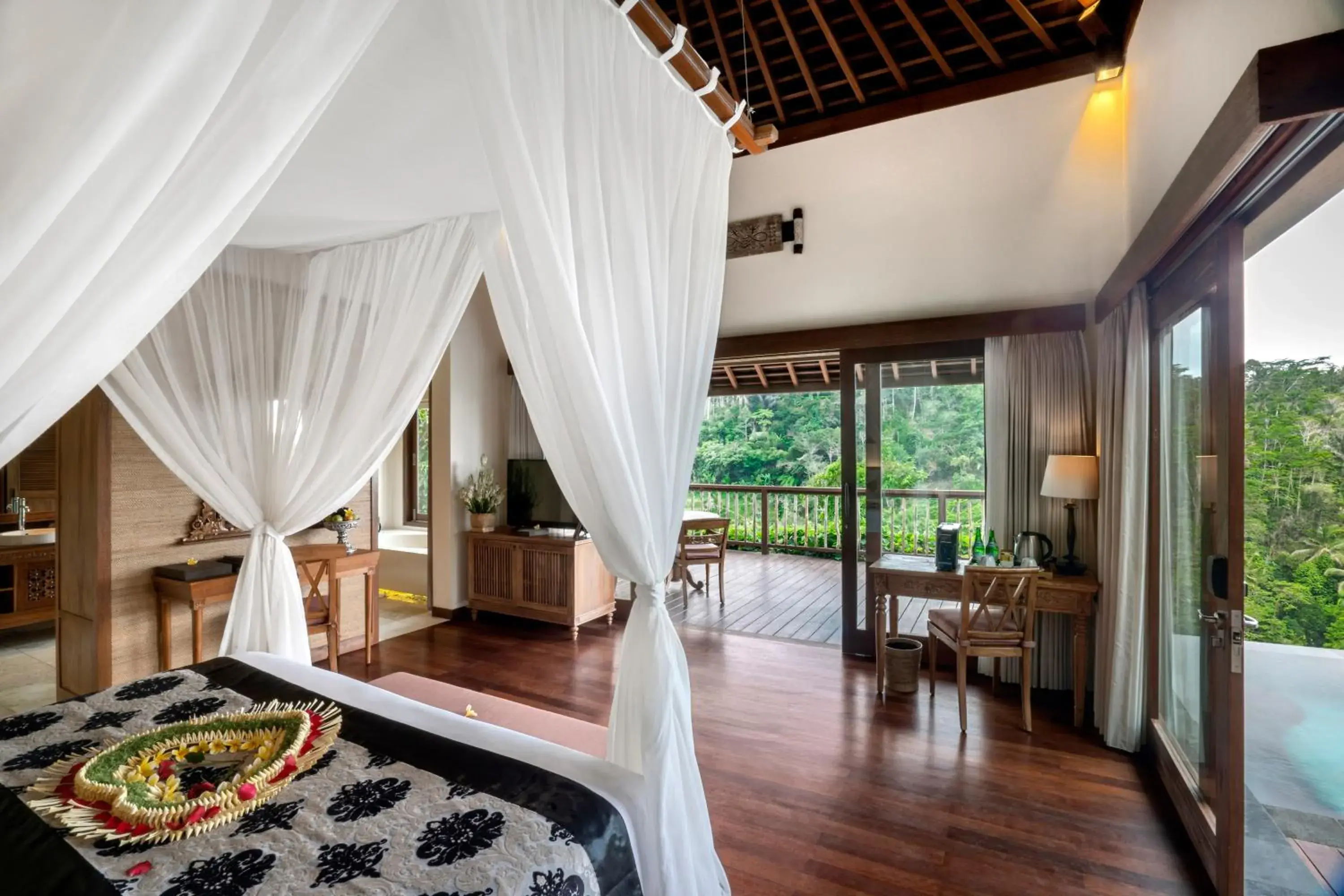 Bed in The Kayon Jungle Resort