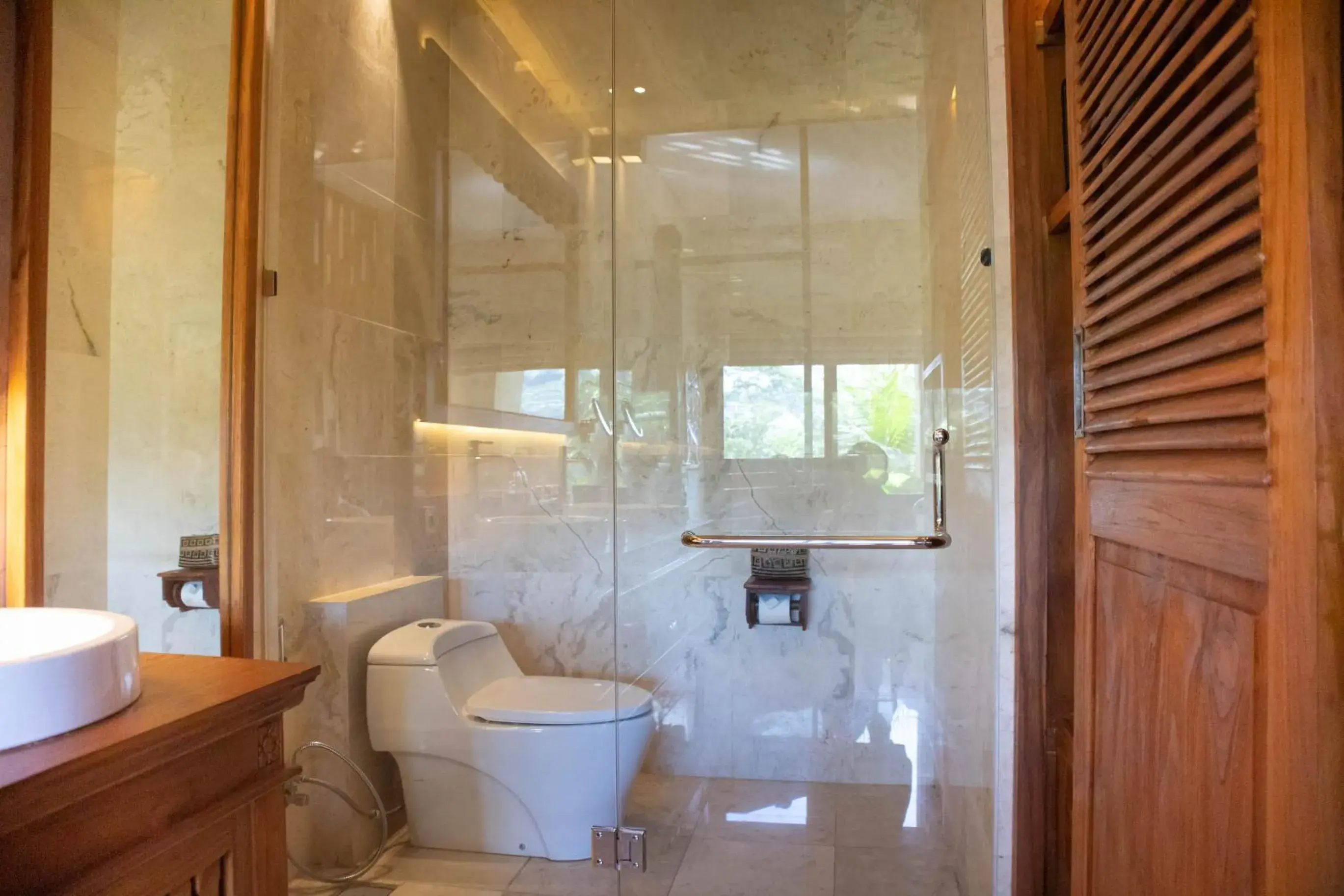 Toilet, Bathroom in The Kayon Jungle Resort