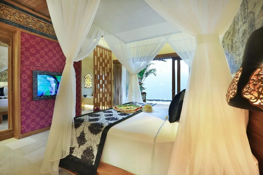 Bed in The Kayon Jungle Resort