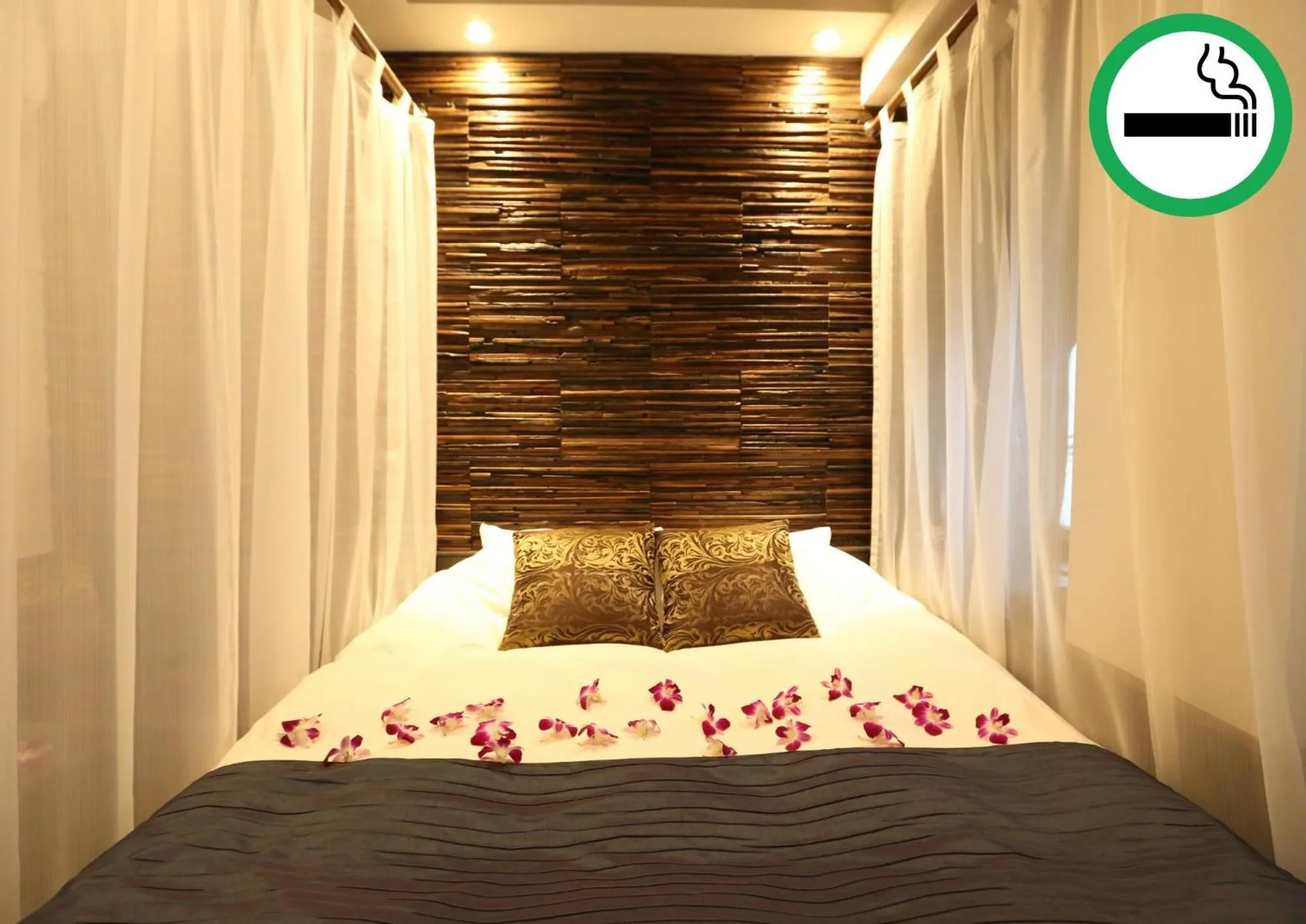 Bed in HOTEL PetitBali Higashi-Shinjuku