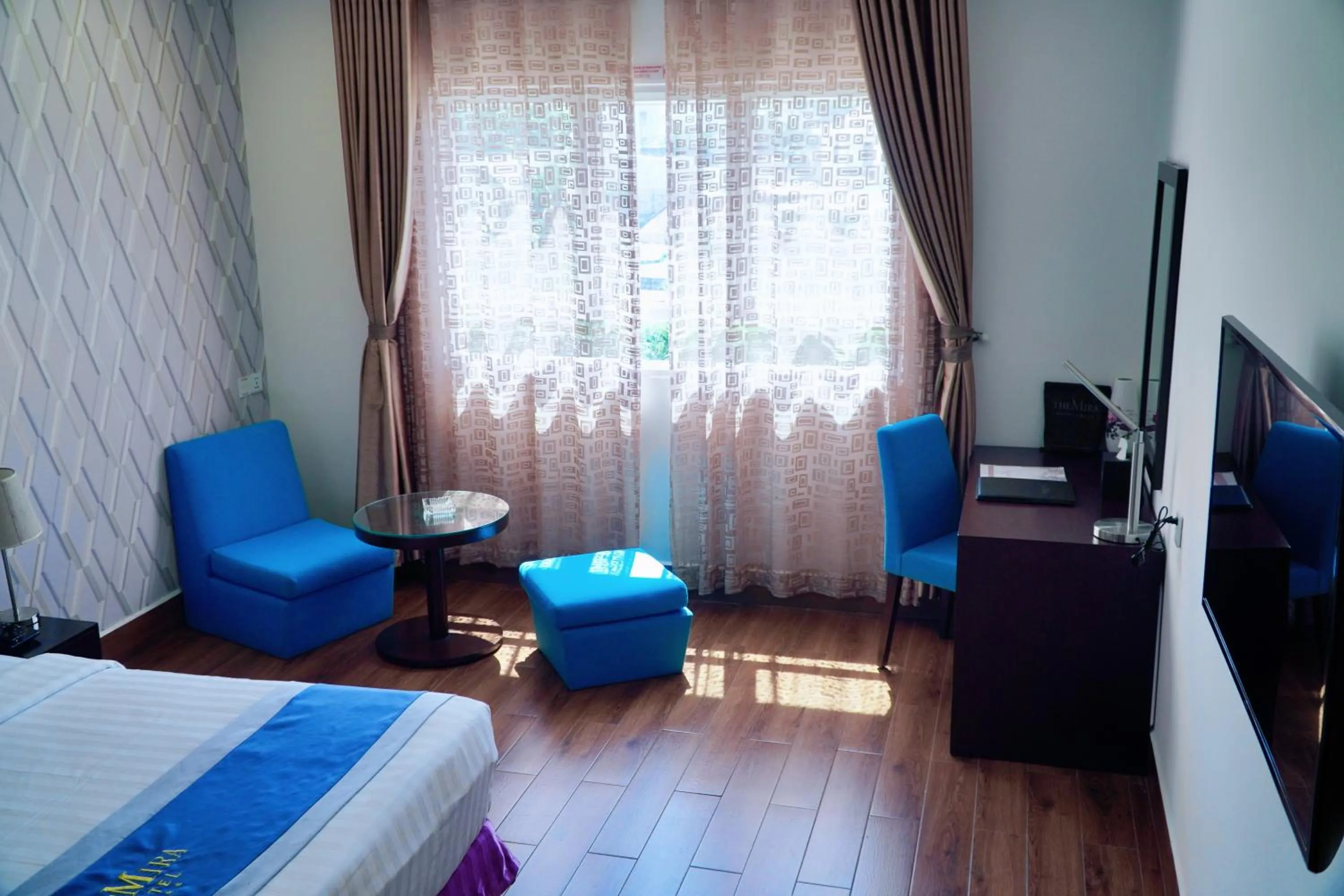 Bed in The Mira Boutique Hotel