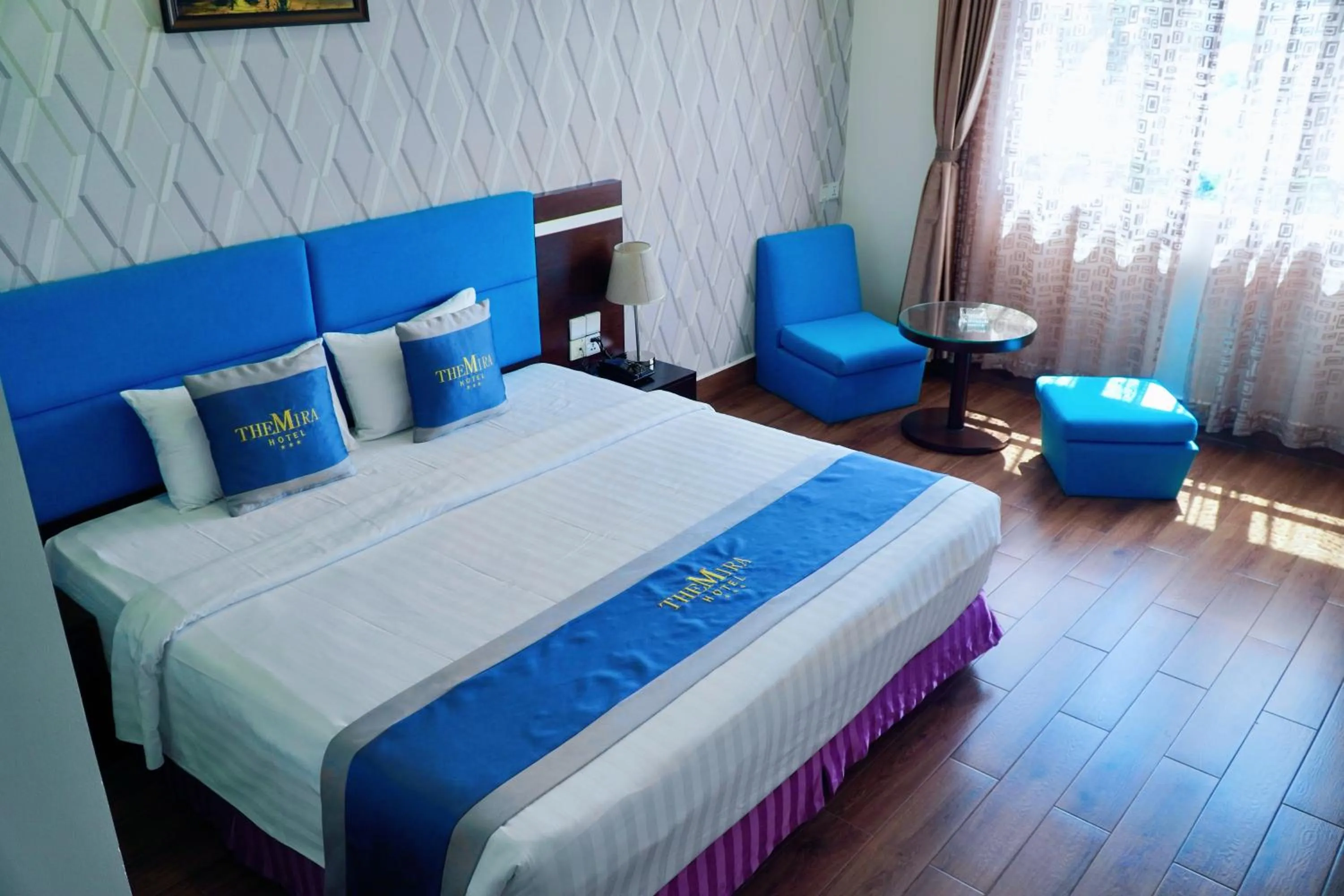 Bed in The Mira Boutique Hotel