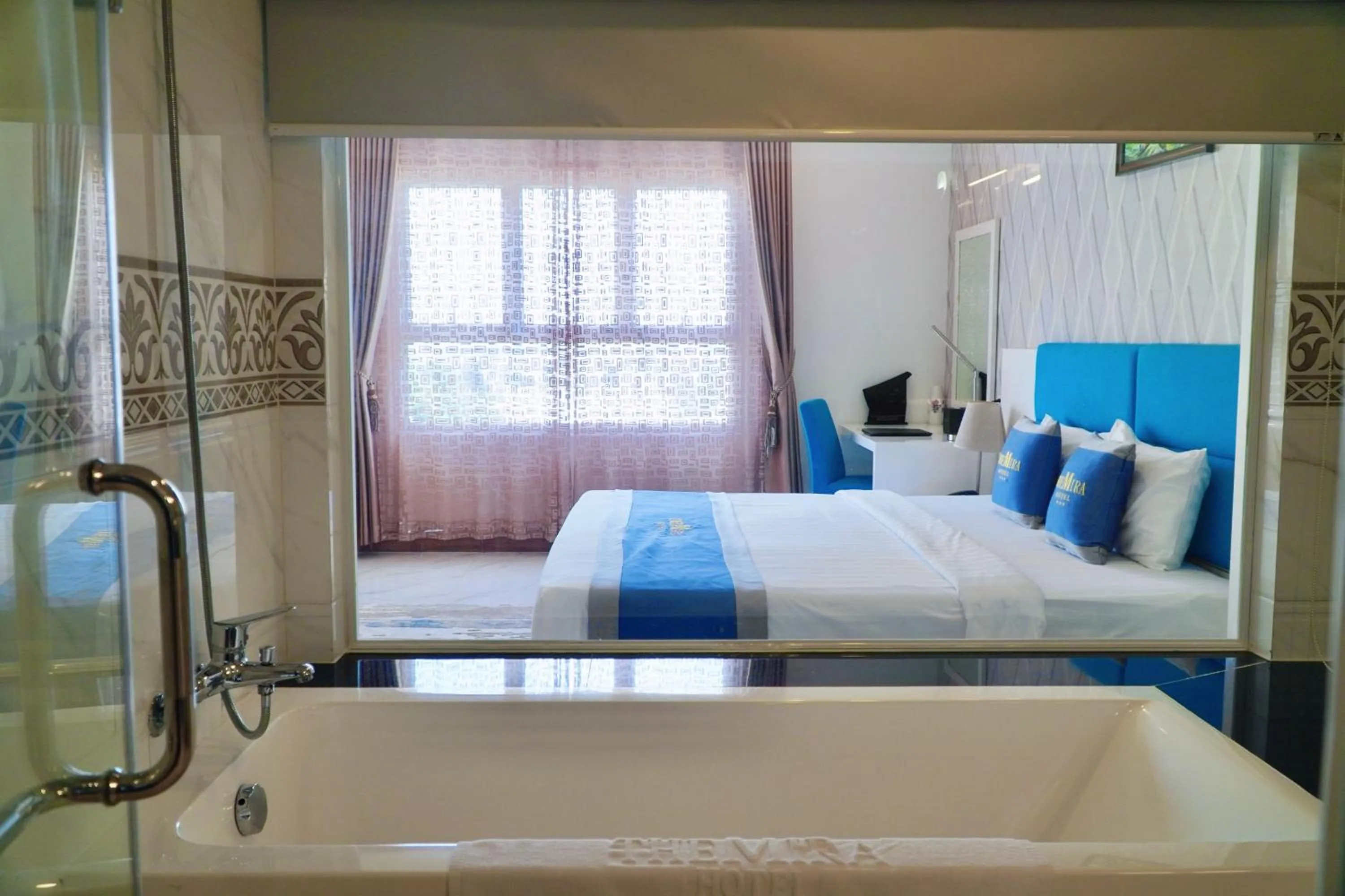 Bed in The Mira Boutique Hotel