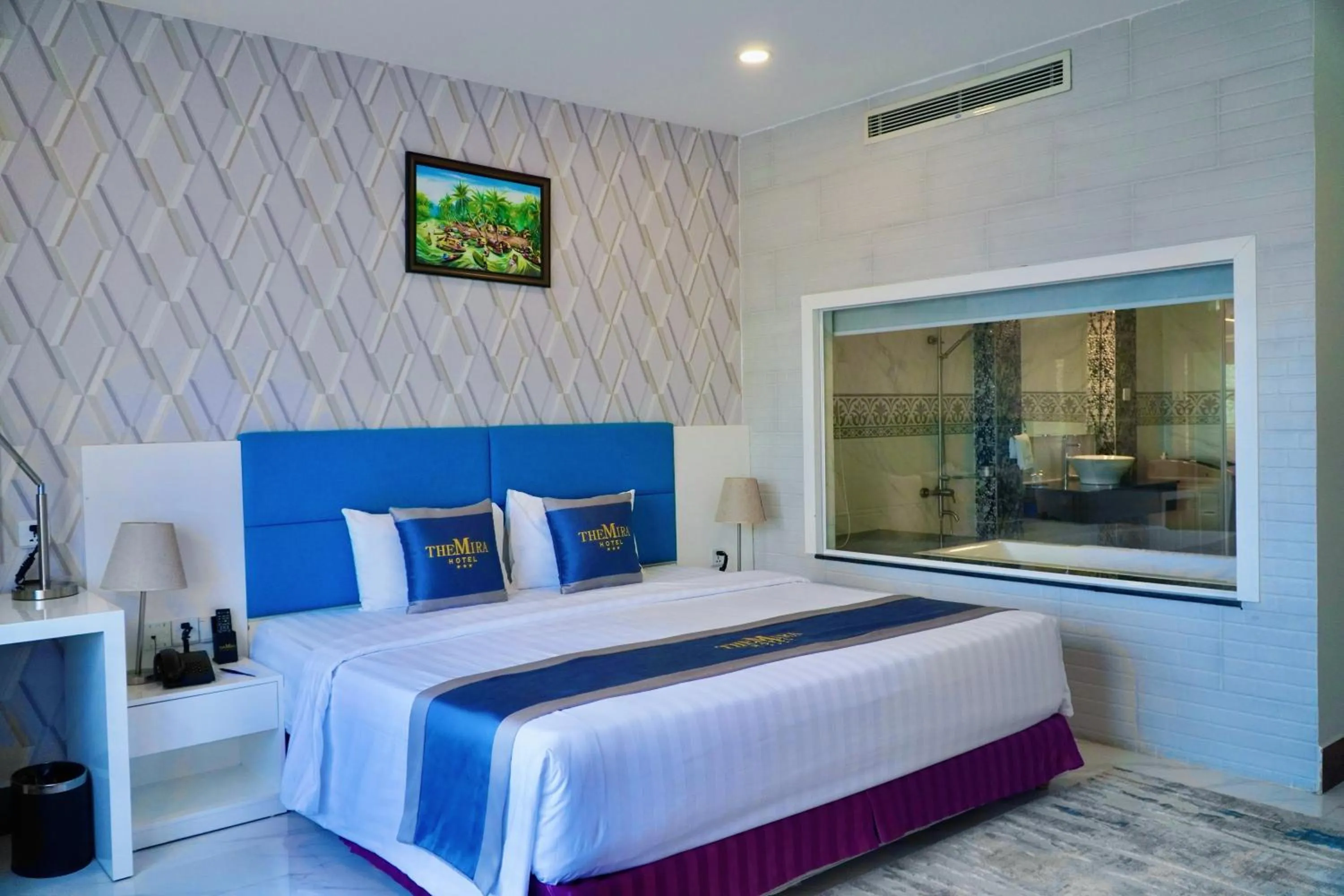 Bed in The Mira Boutique Hotel