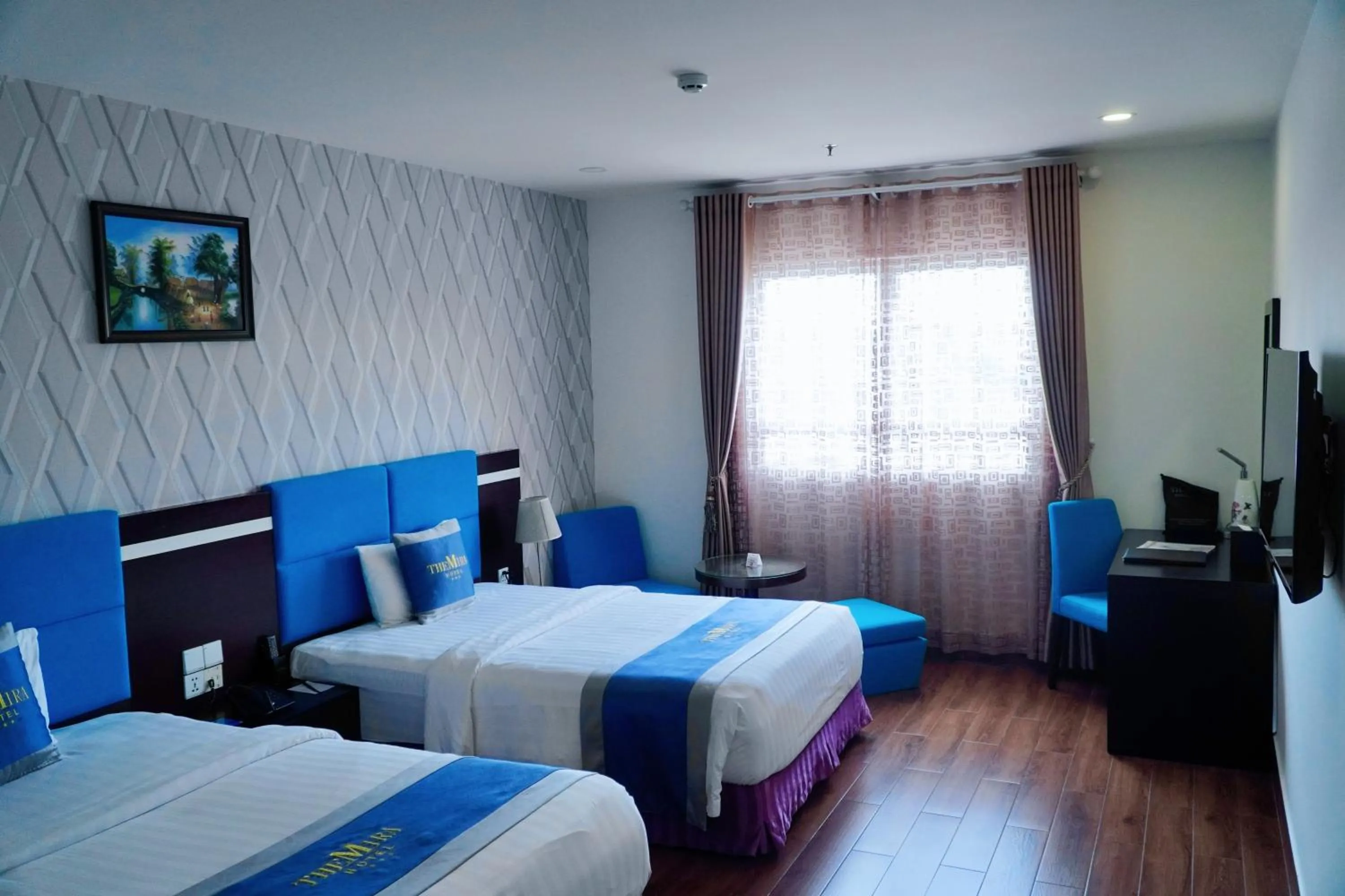 Bed in The Mira Boutique Hotel