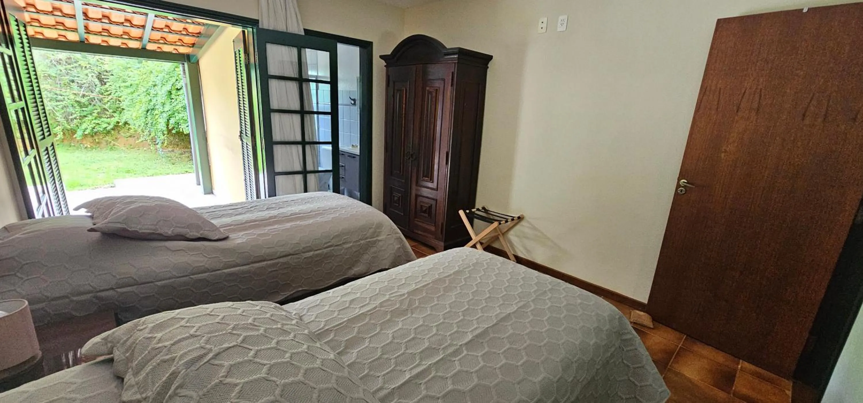 Bed in Pousada dos Anjos