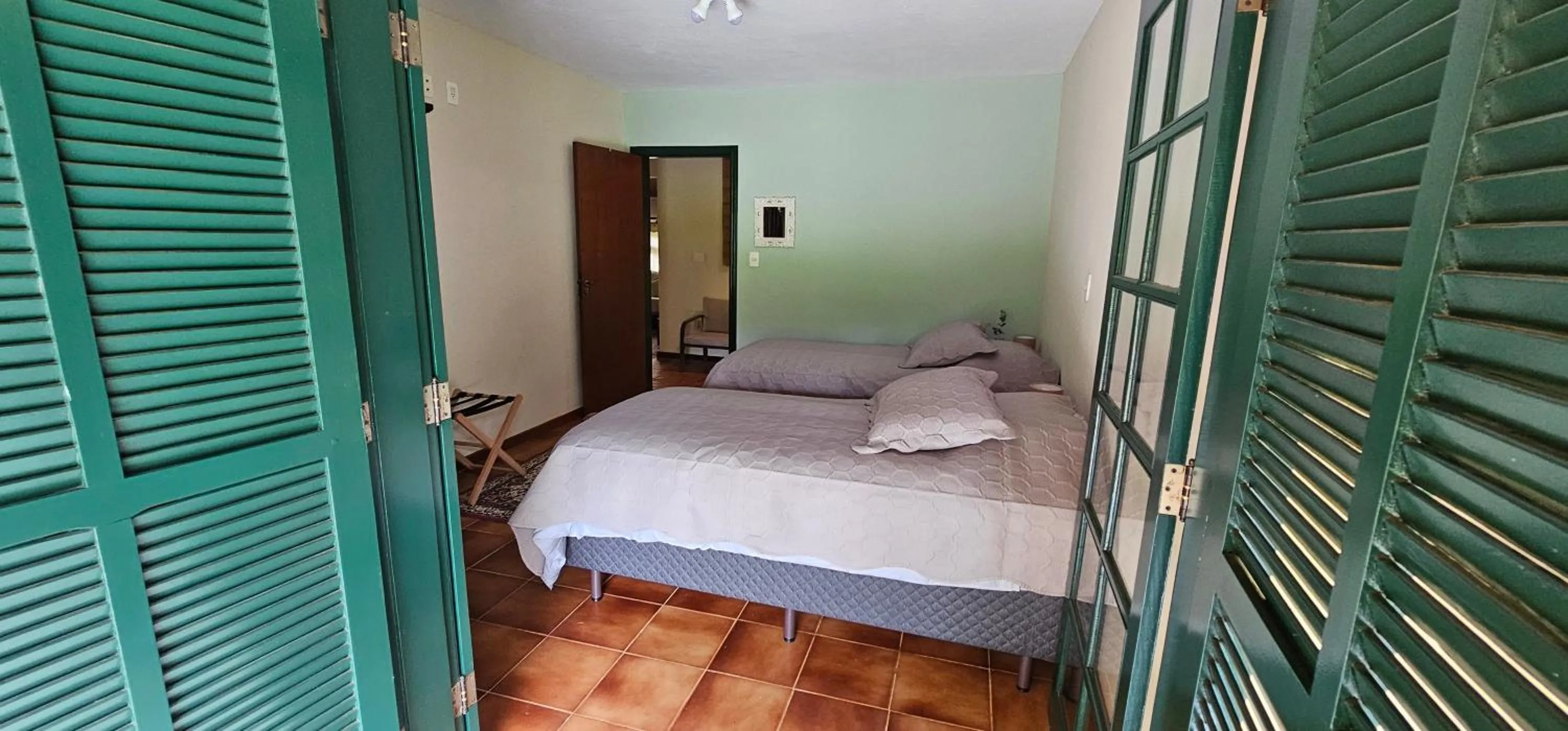 Bed in Pousada dos Anjos