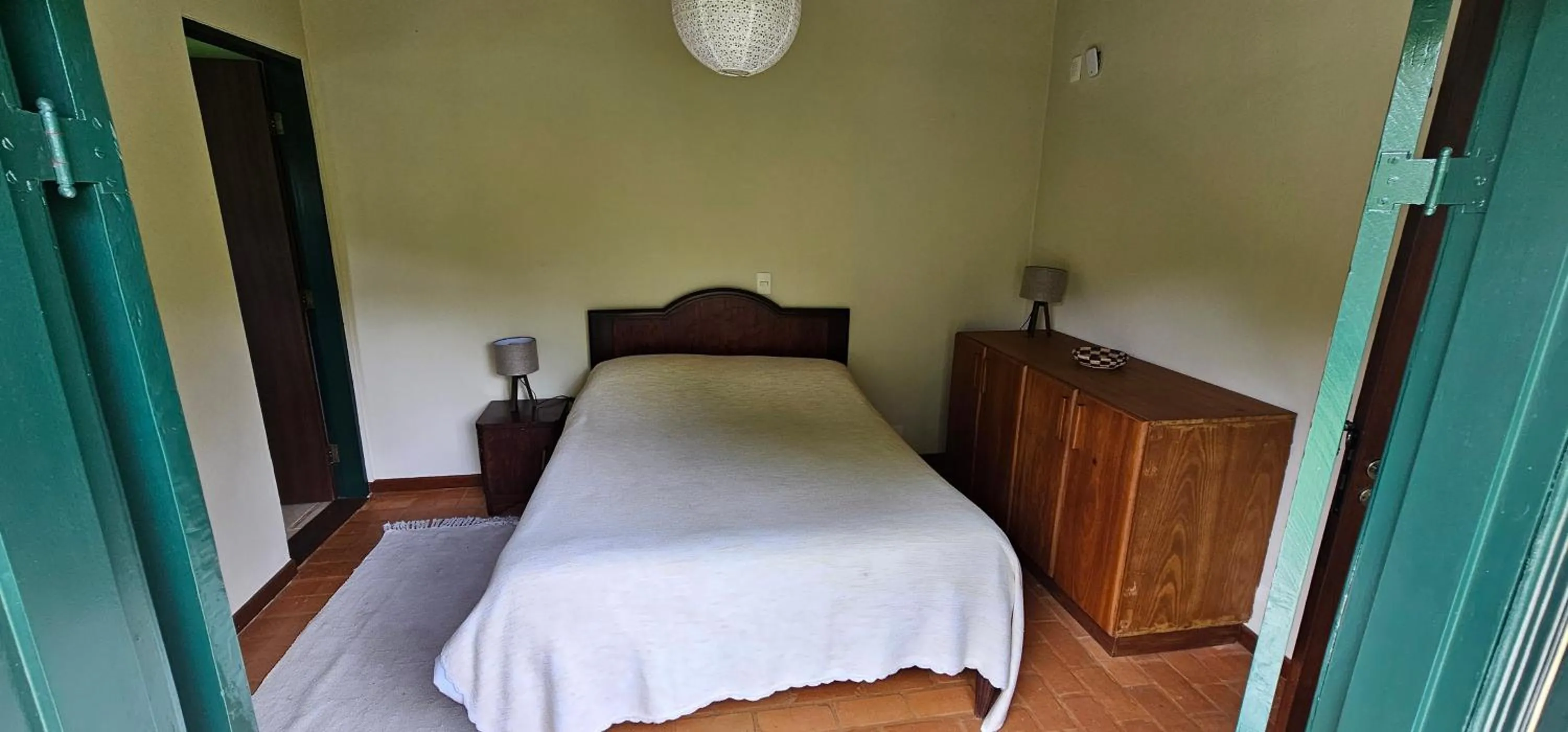 Bed in Pousada dos Anjos