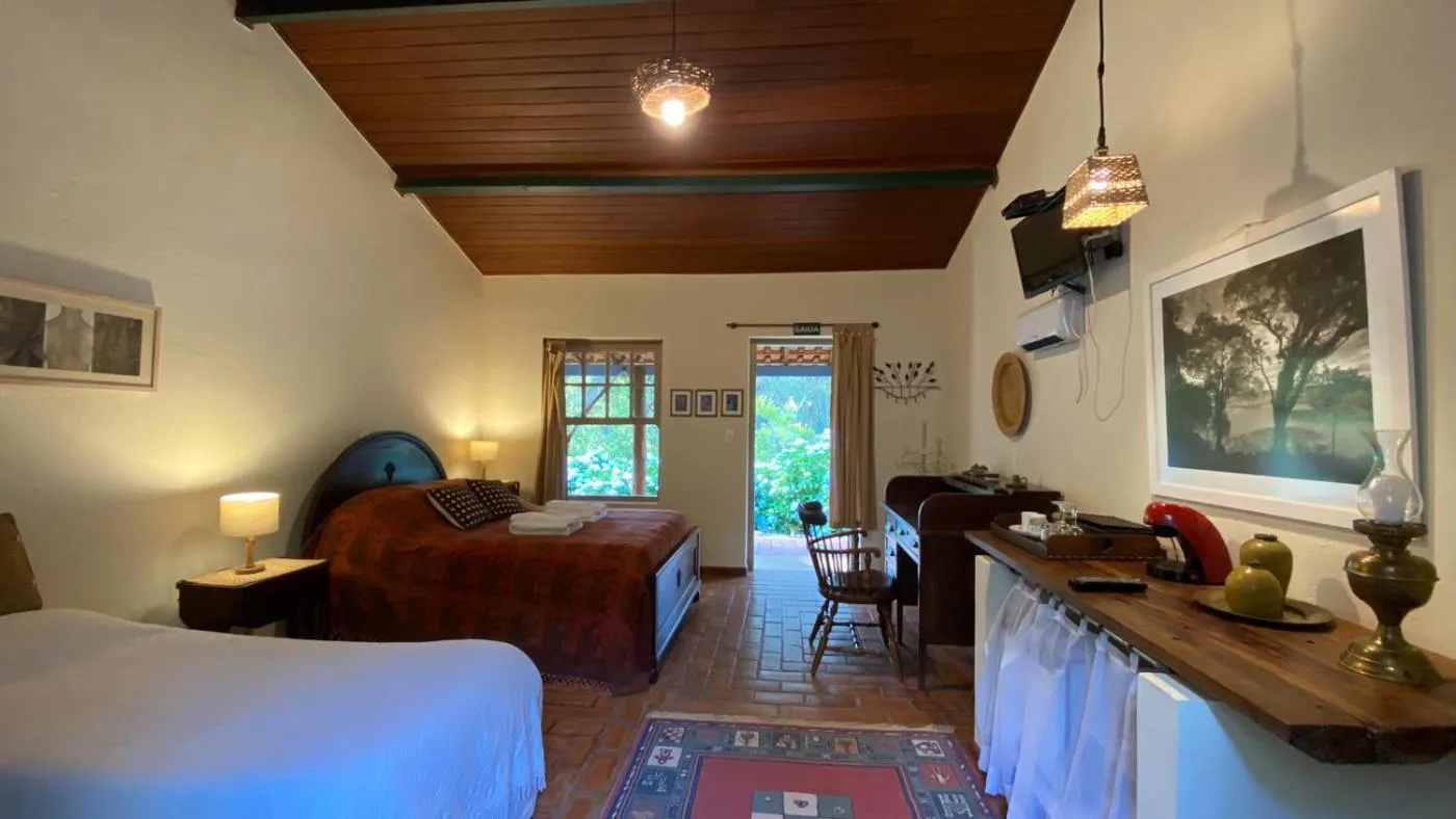 Bed in Pousada dos Anjos