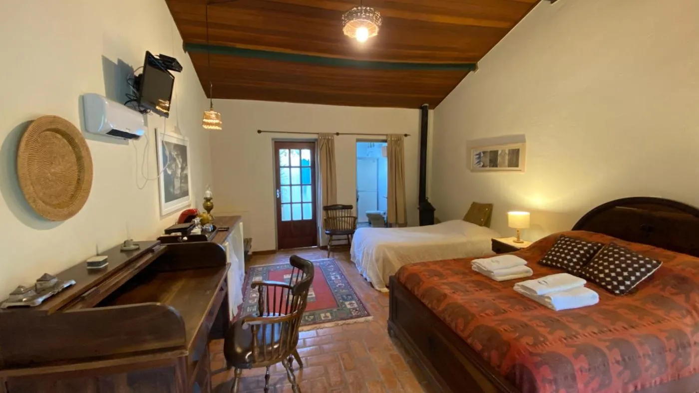 Bed in Pousada dos Anjos