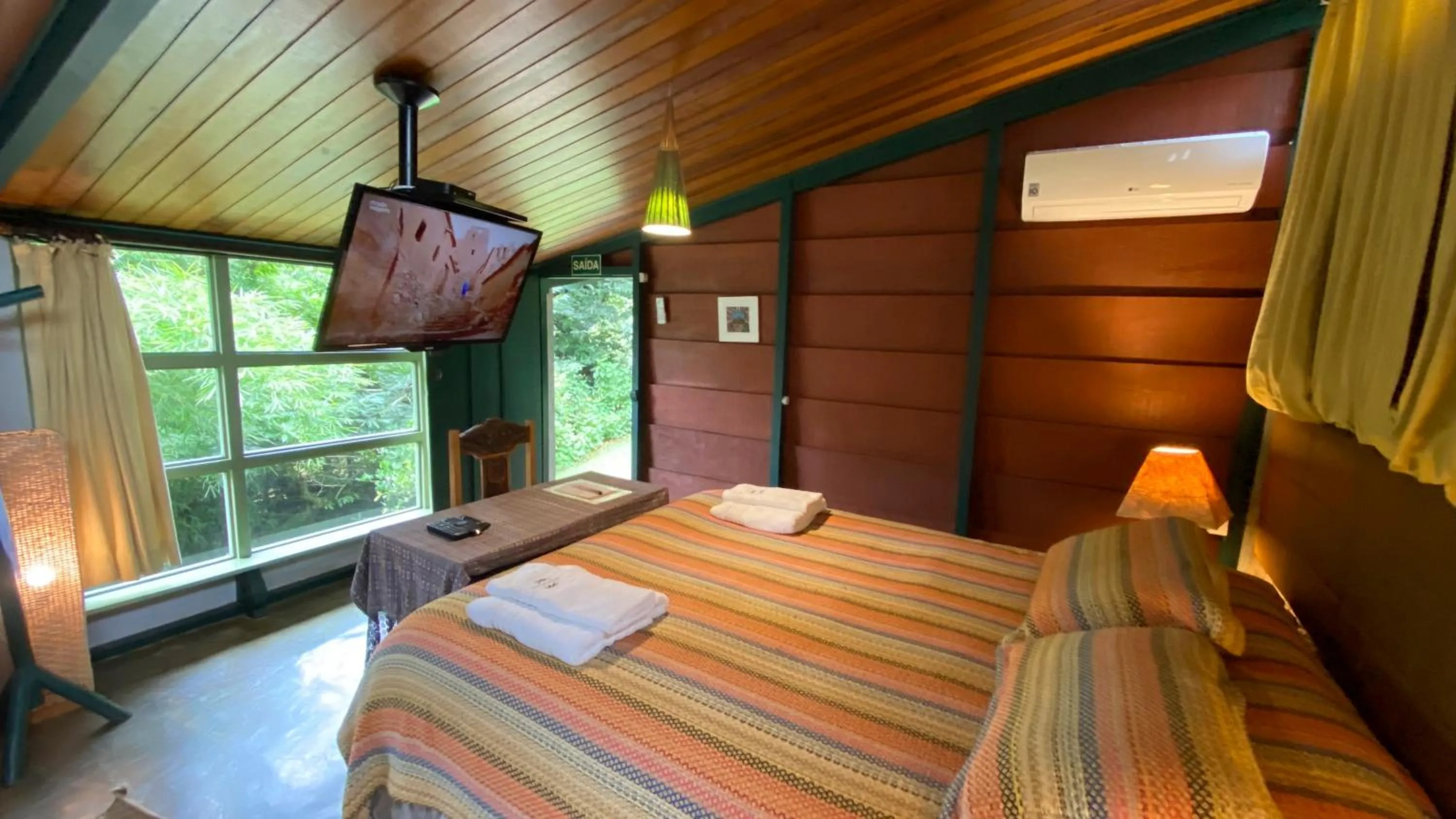 Bed in Pousada dos Anjos