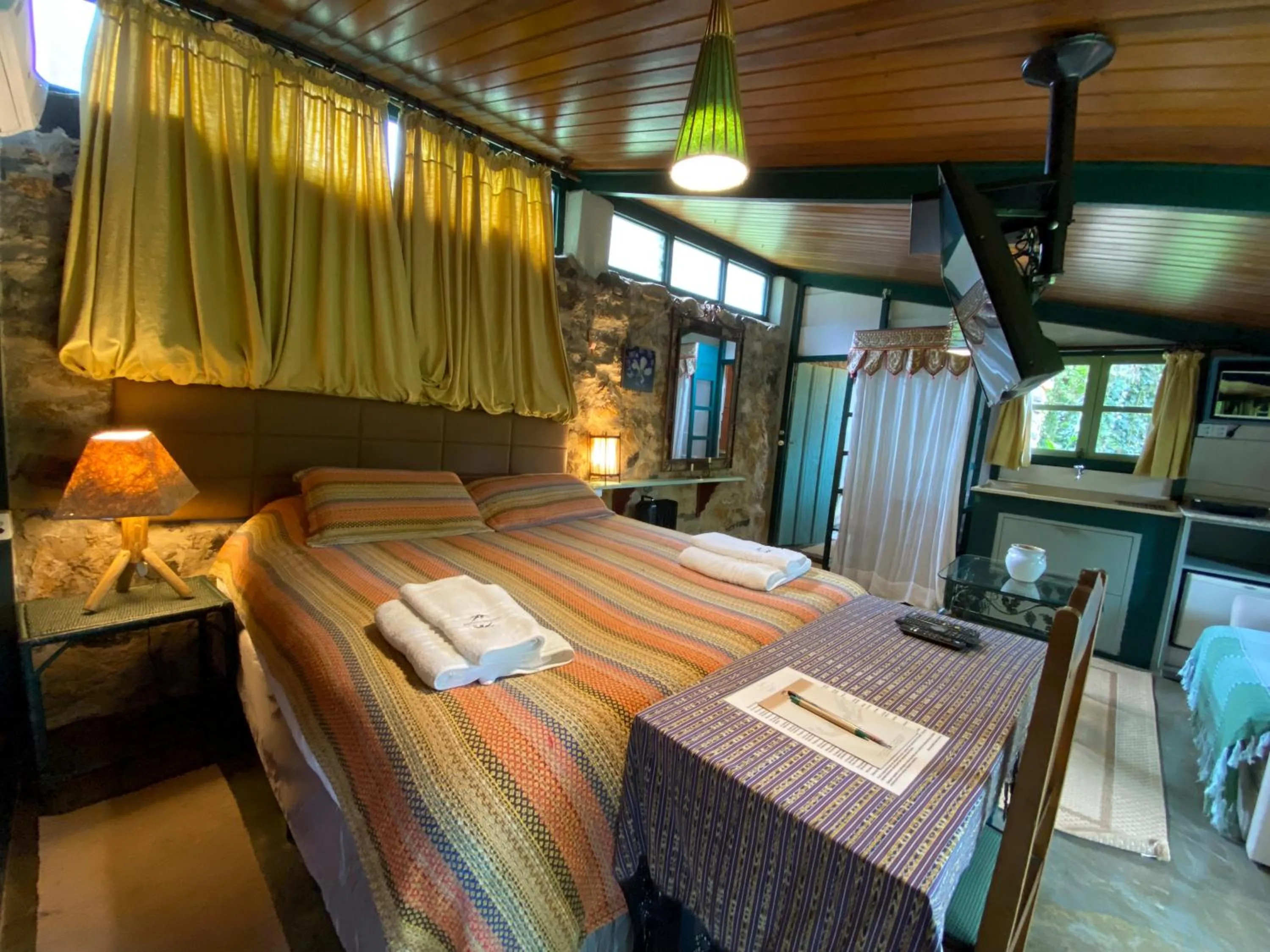Bed in Pousada dos Anjos