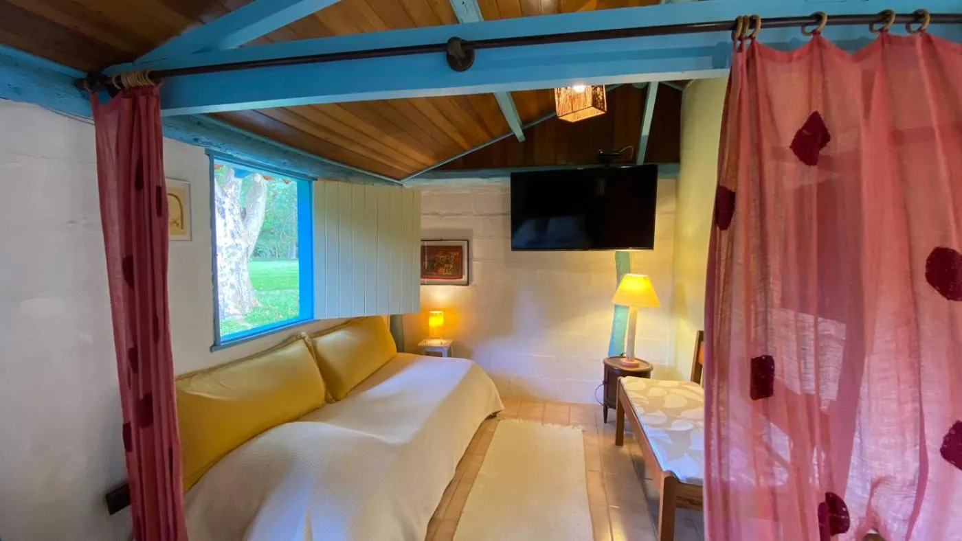 Bed in Pousada dos Anjos