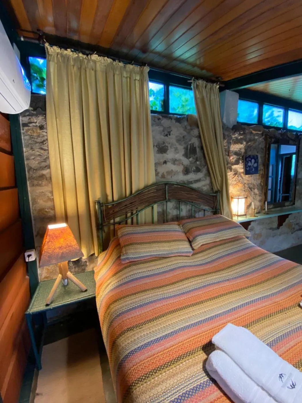 Bed in Pousada dos Anjos