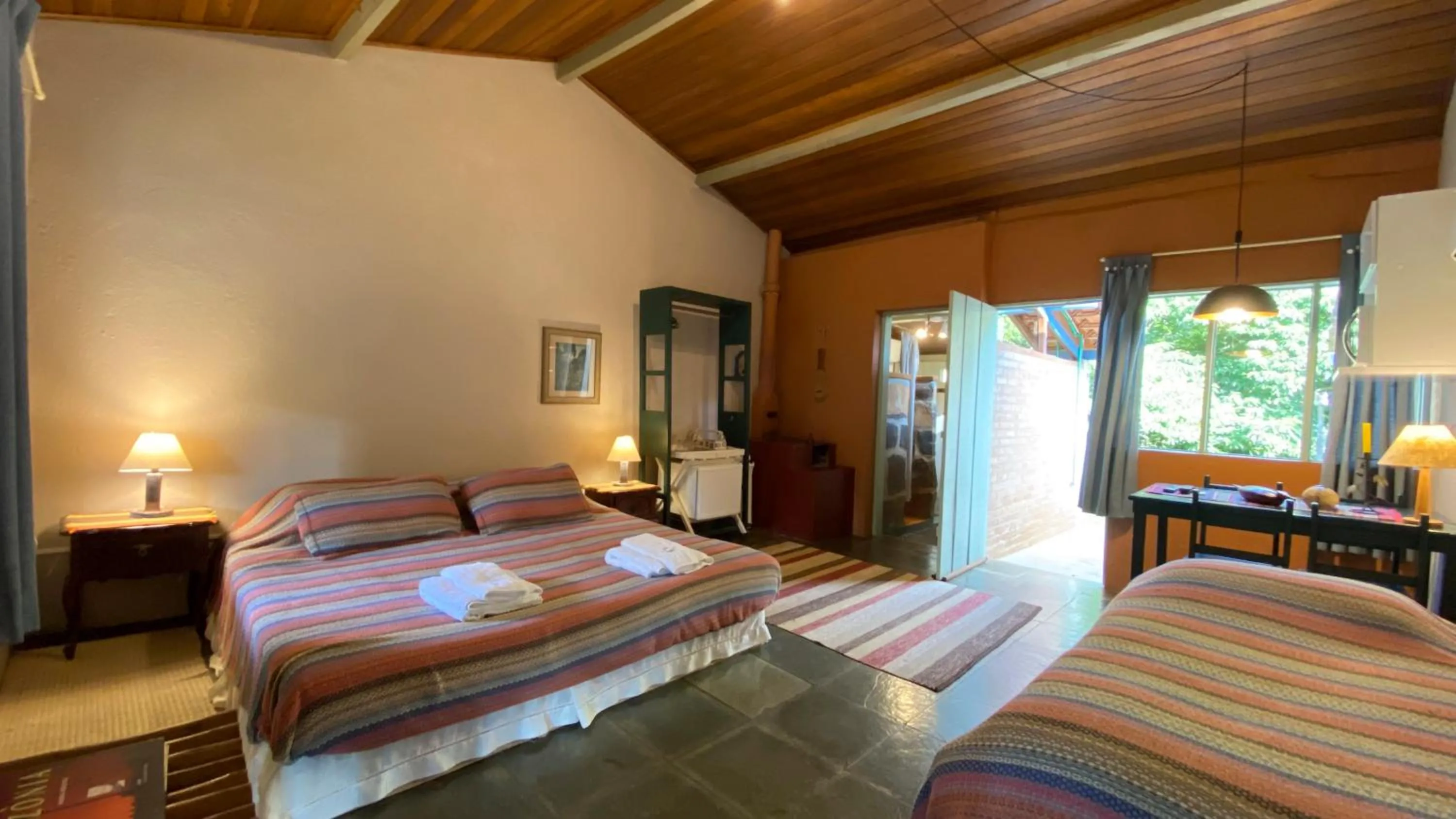 Bed in Pousada dos Anjos