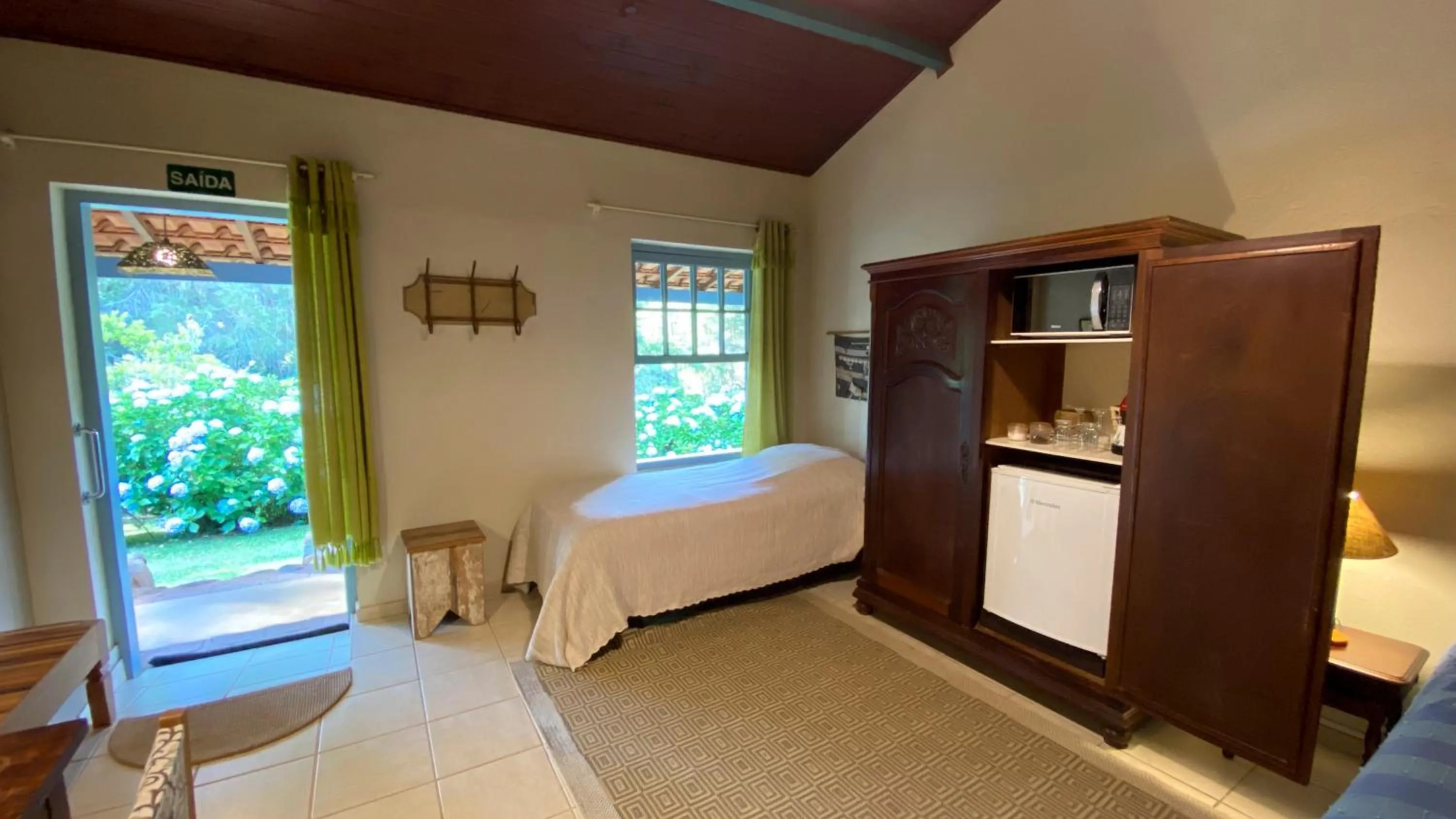 Bed in Pousada dos Anjos