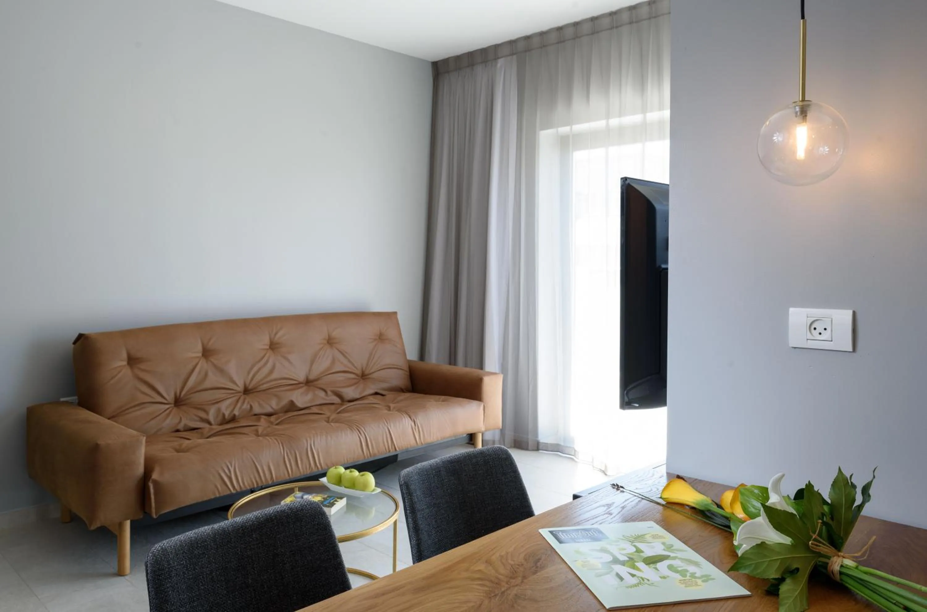 Living room in The Roof - By Sea Land Suites