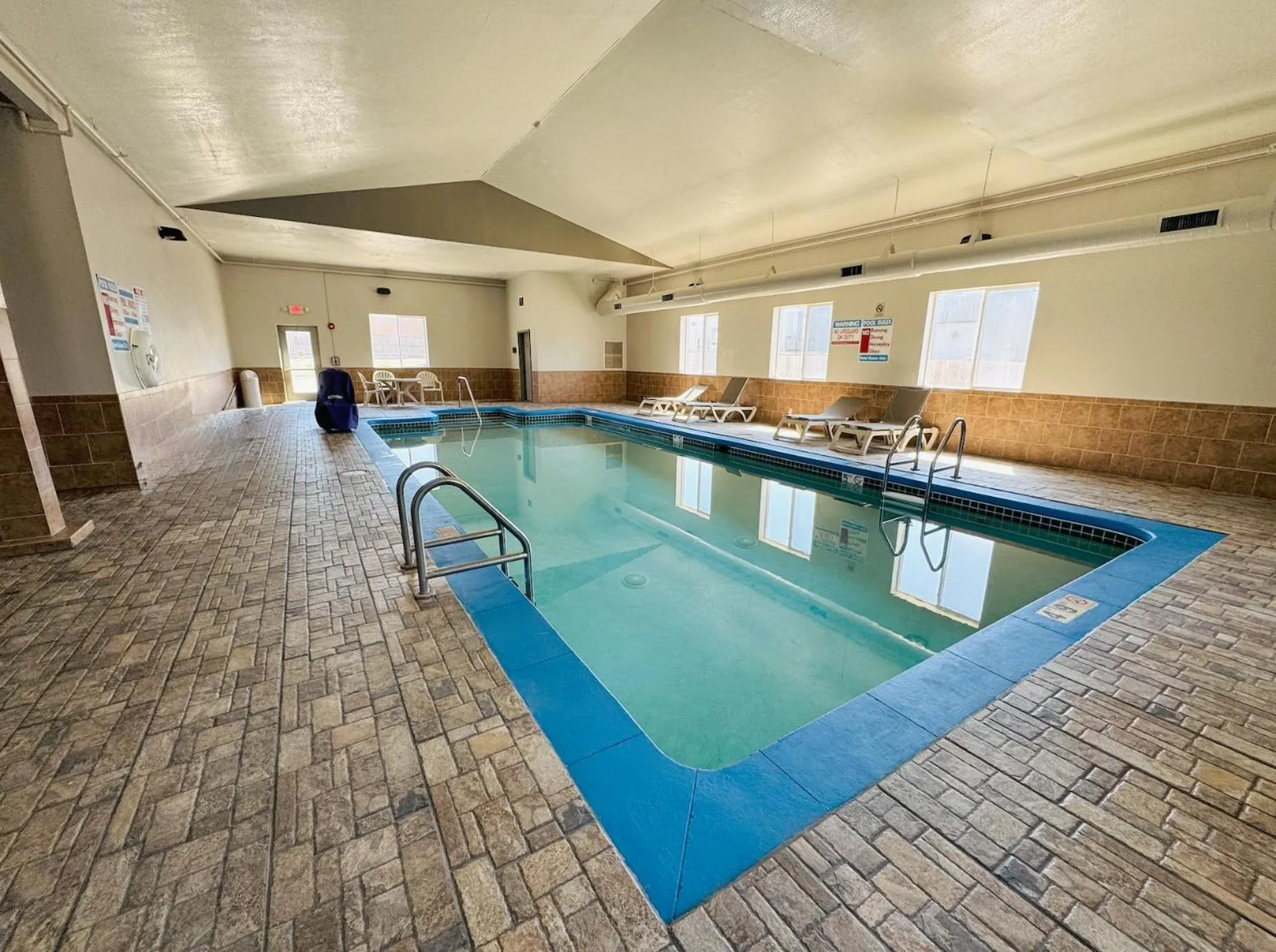 Swimming pool in Days Inn & Suites by Wyndham Cedar Rapids