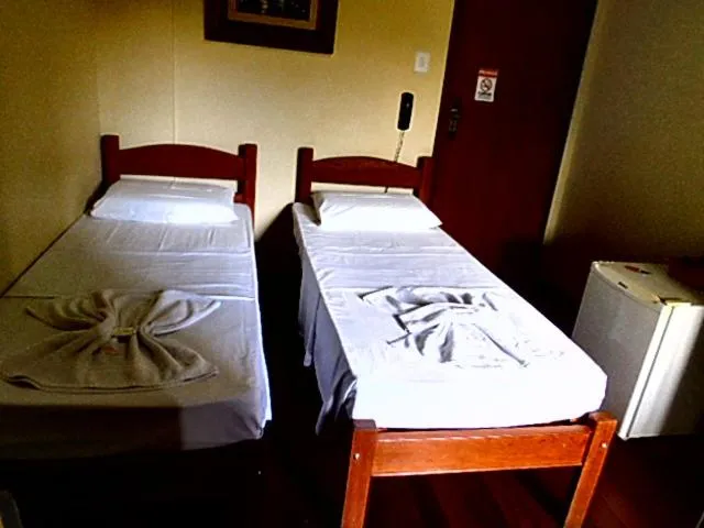 Bed in Pousada Rainha dos Anjos