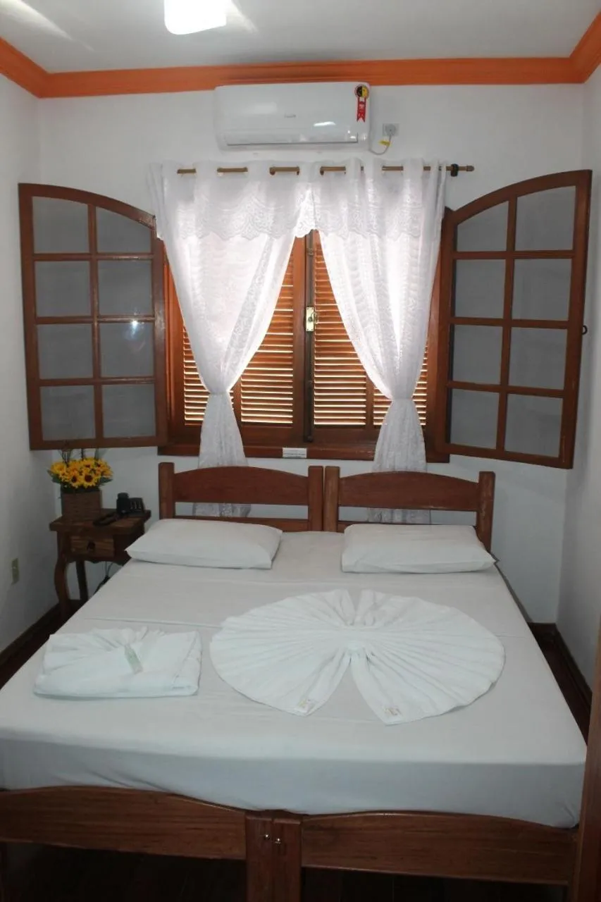 Bed in Pousada Rainha dos Anjos