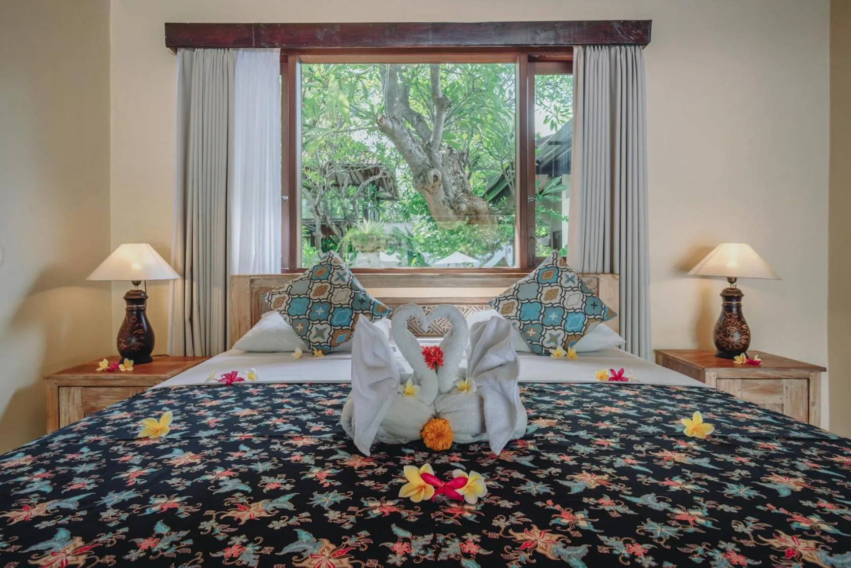 Bed in Frangipani Beach Hotel