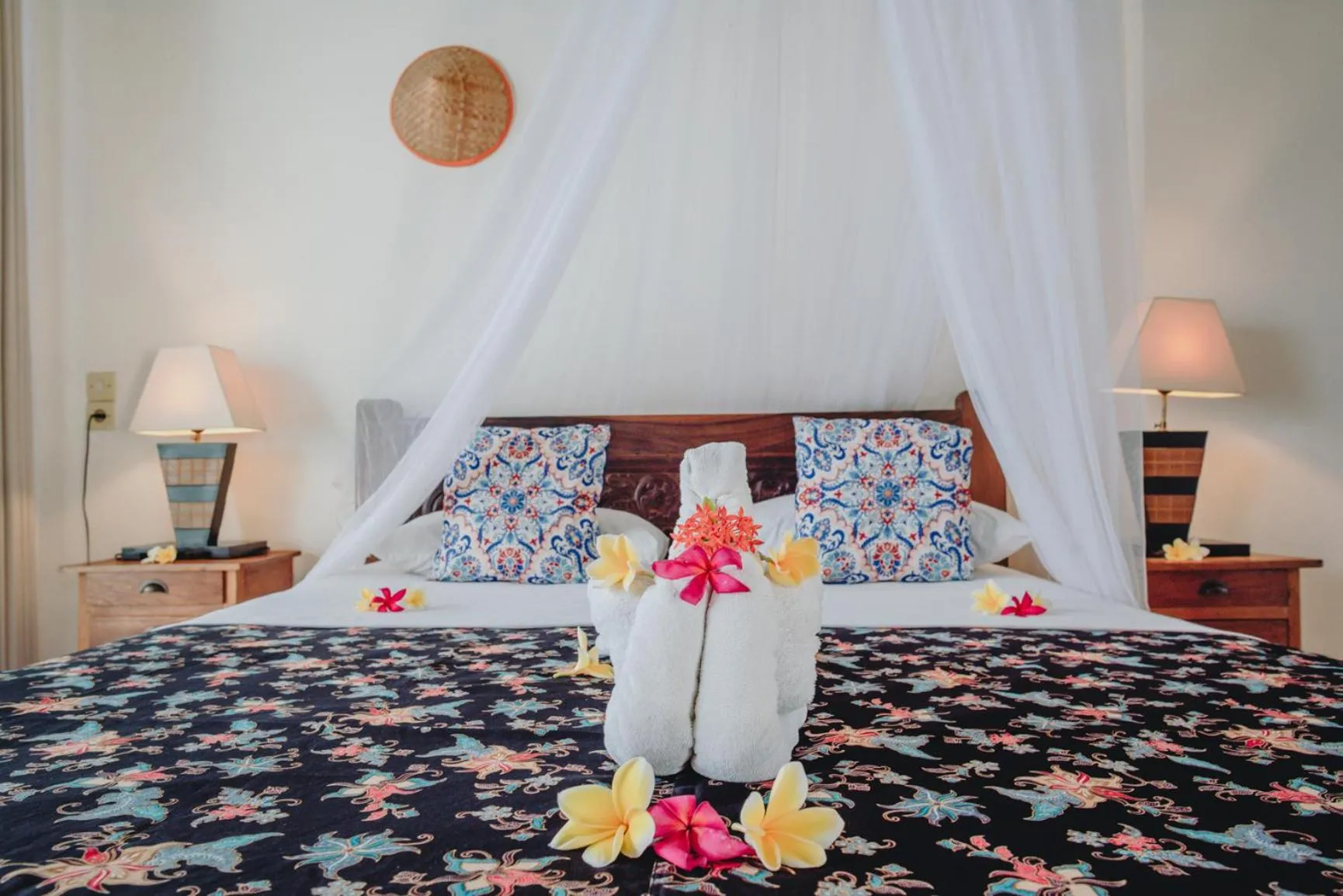 Bed in Frangipani Beach Hotel