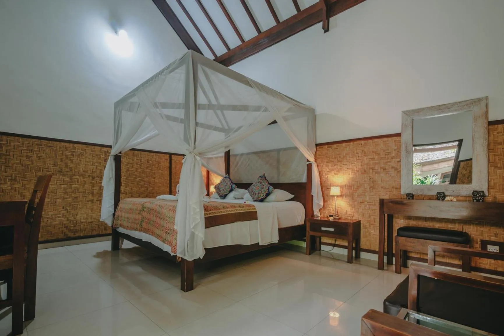 Bed in Frangipani Beach Hotel