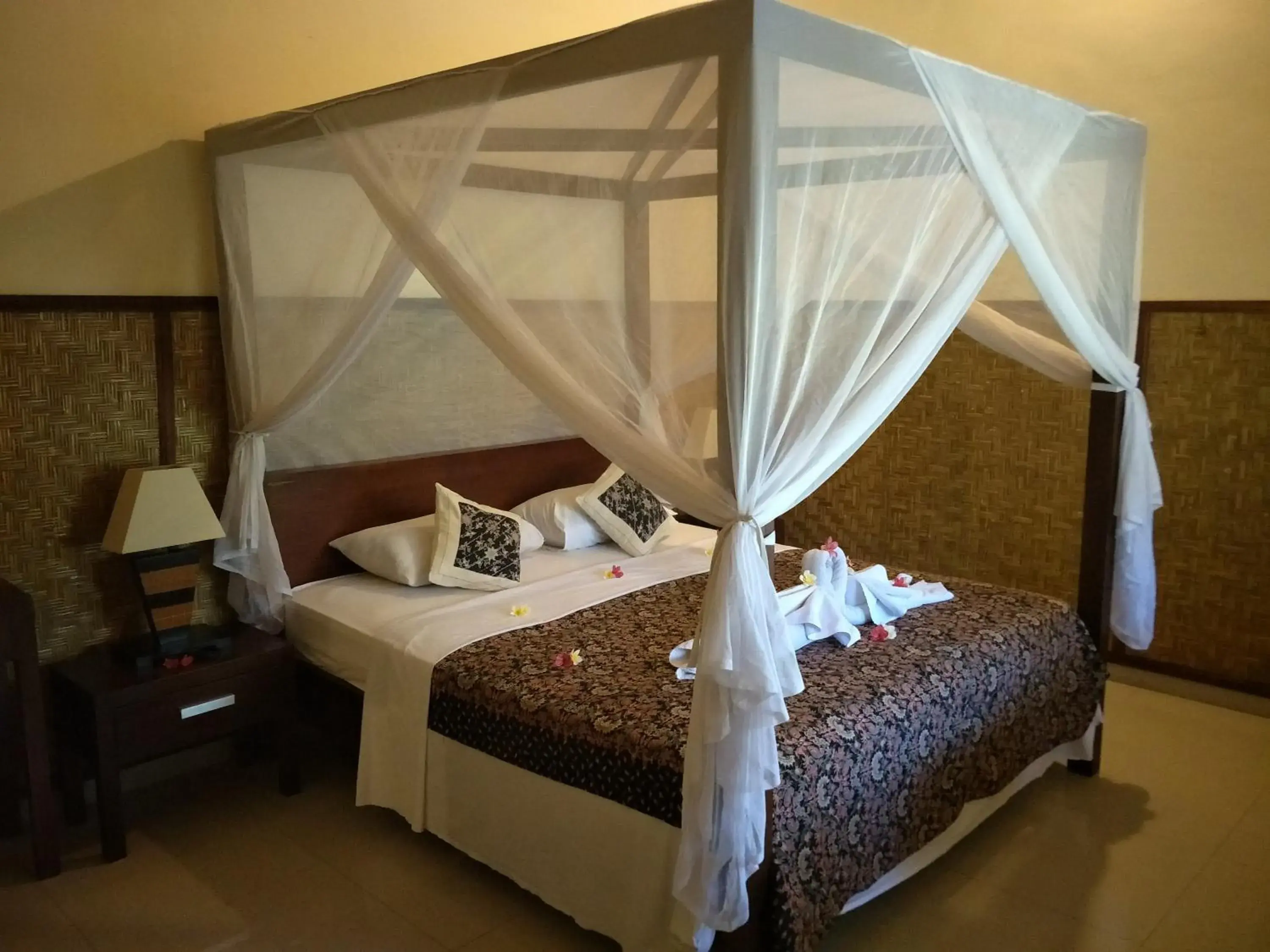 Bed in Frangipani Beach Hotel Bed in Frangipani Beach Hotel