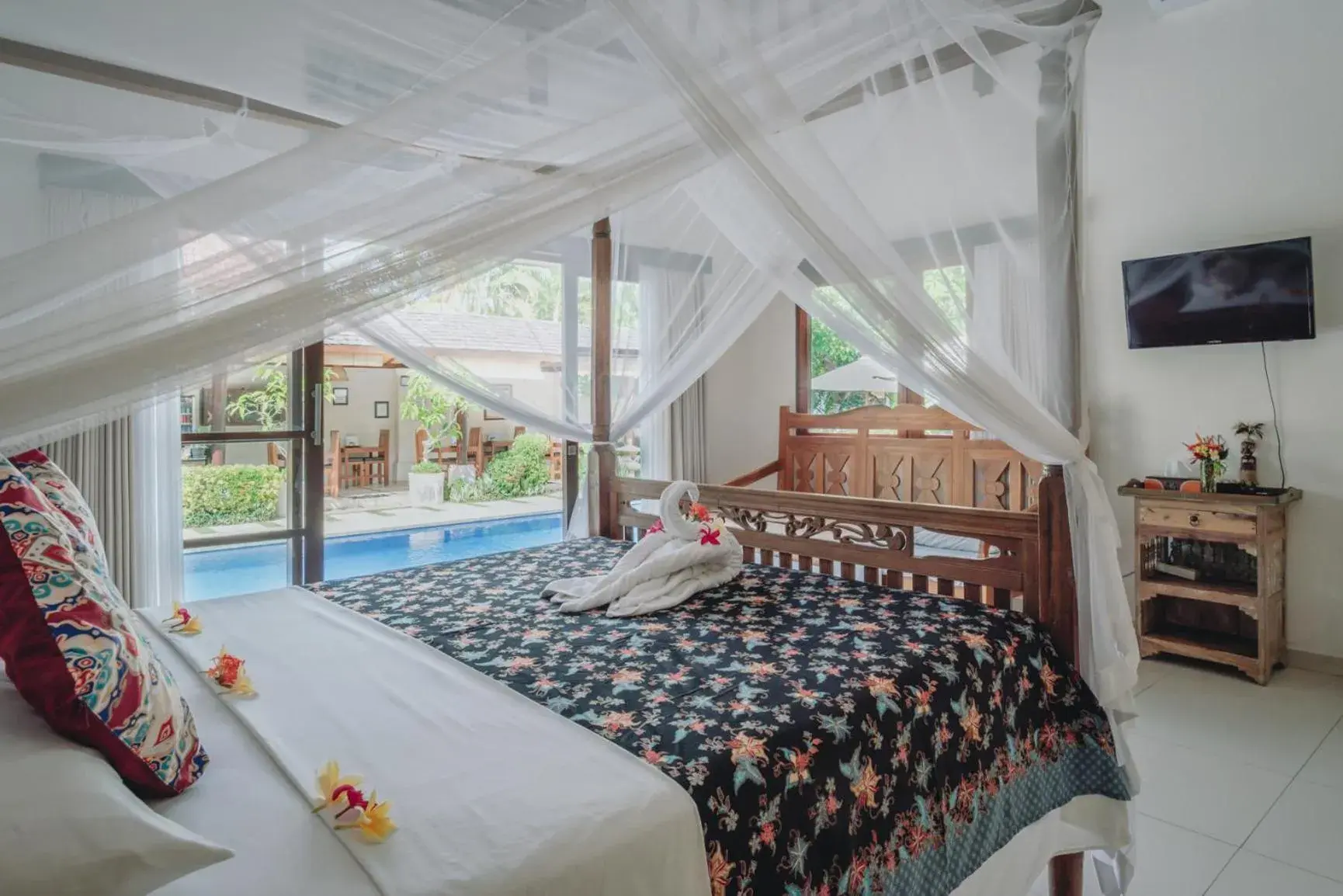 Bed in Frangipani Beach Hotel Bed in Frangipani Beach Hotel