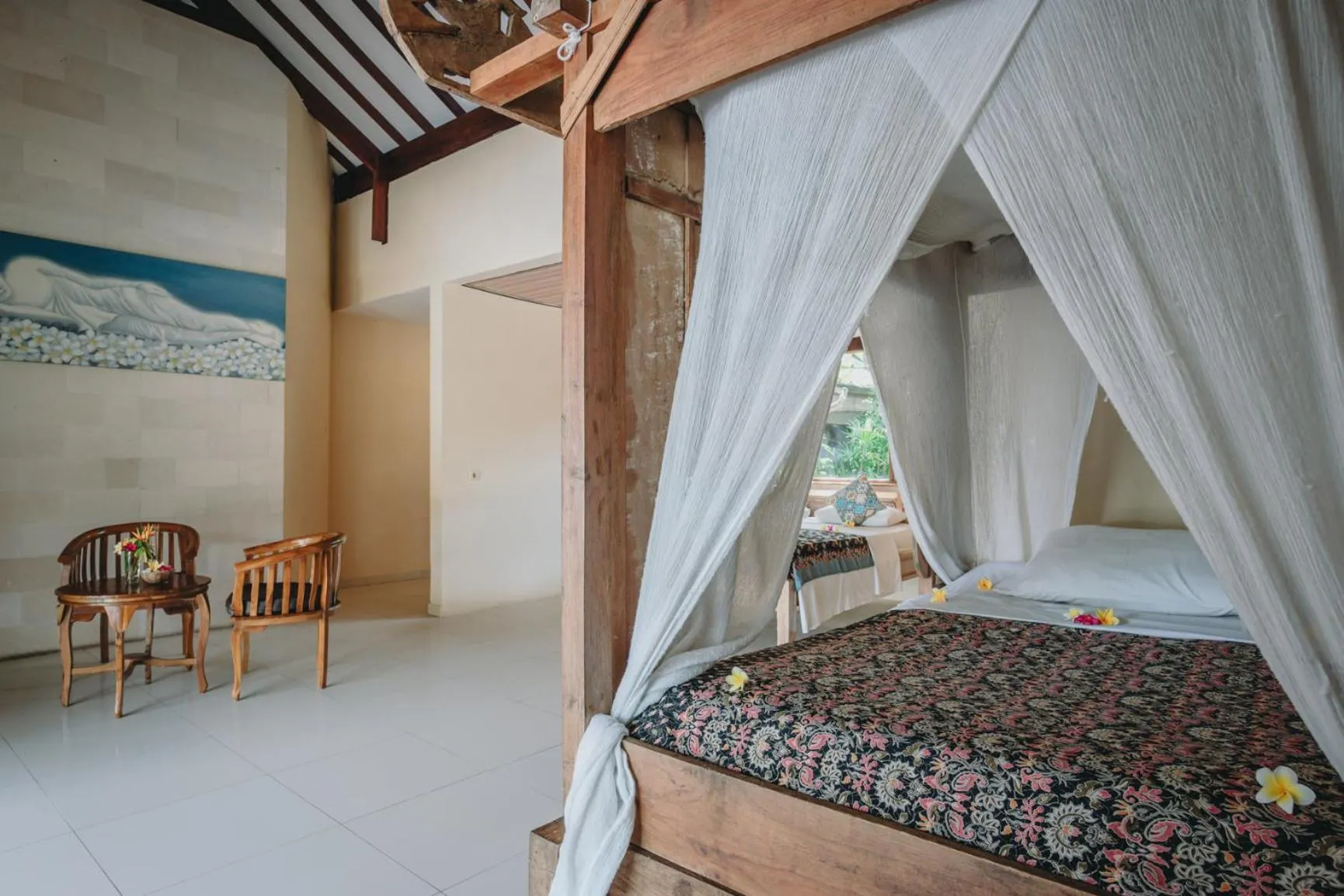 Bed in Frangipani Beach Hotel