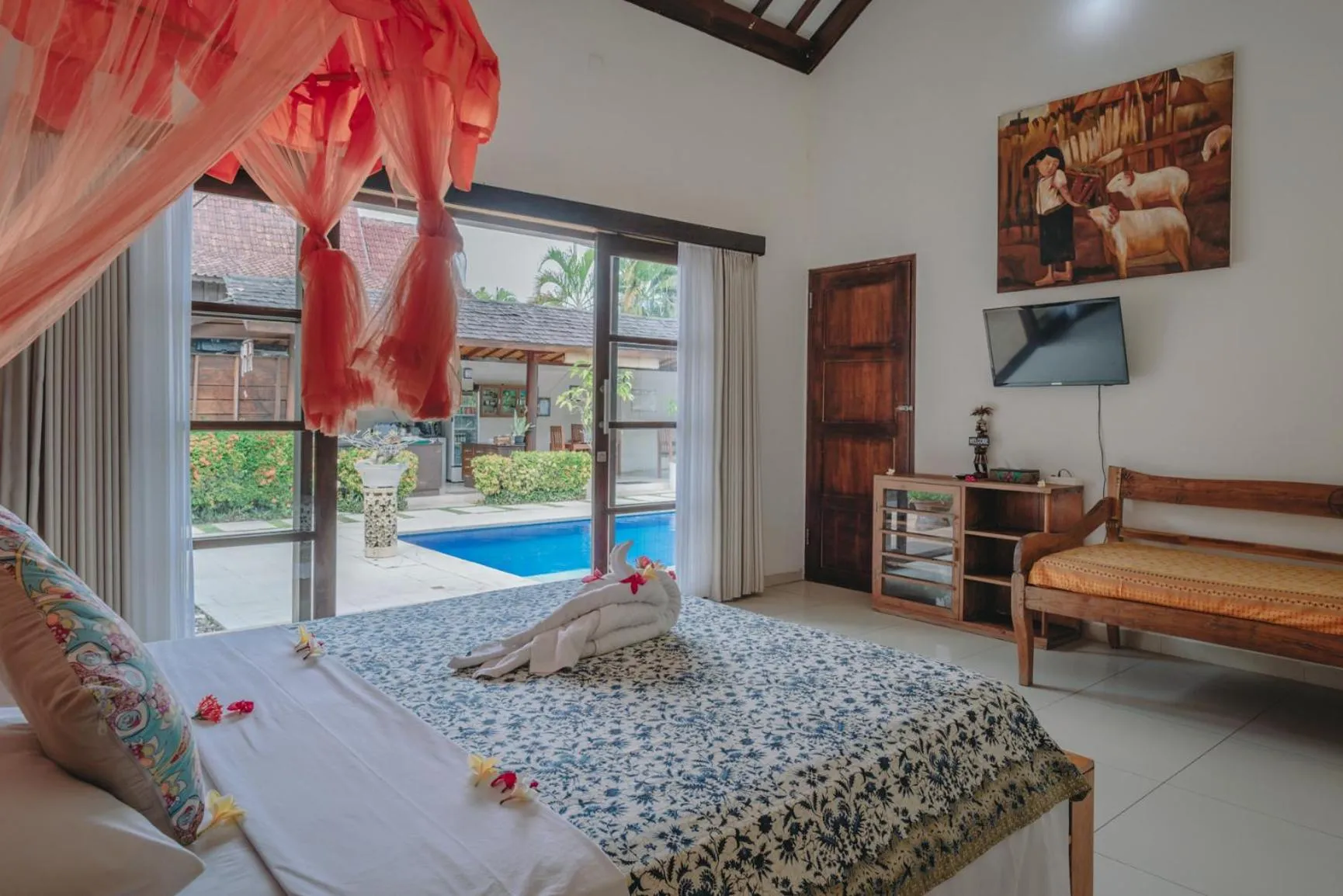 Bed in Frangipani Beach Hotel