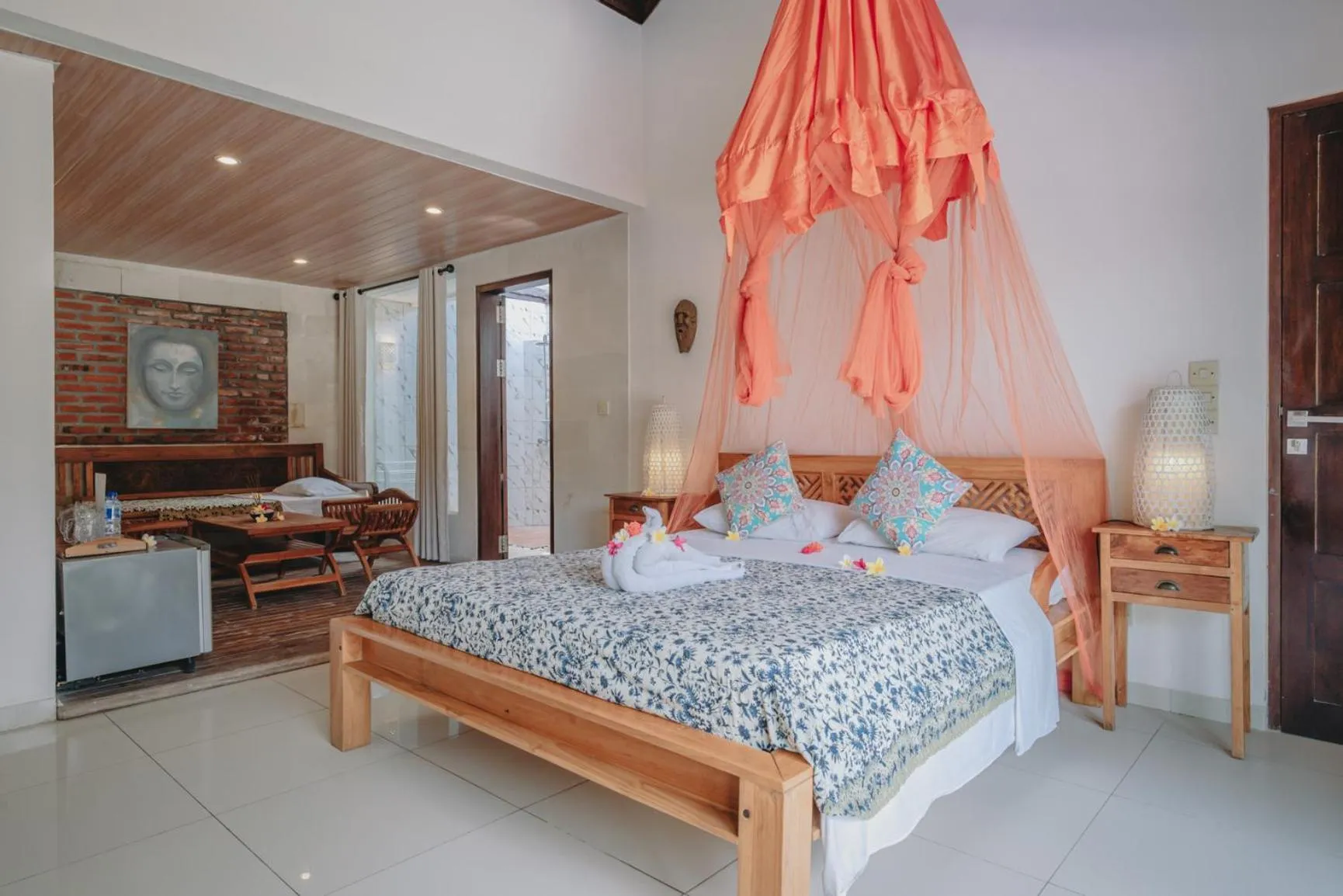 Bed in Frangipani Beach Hotel