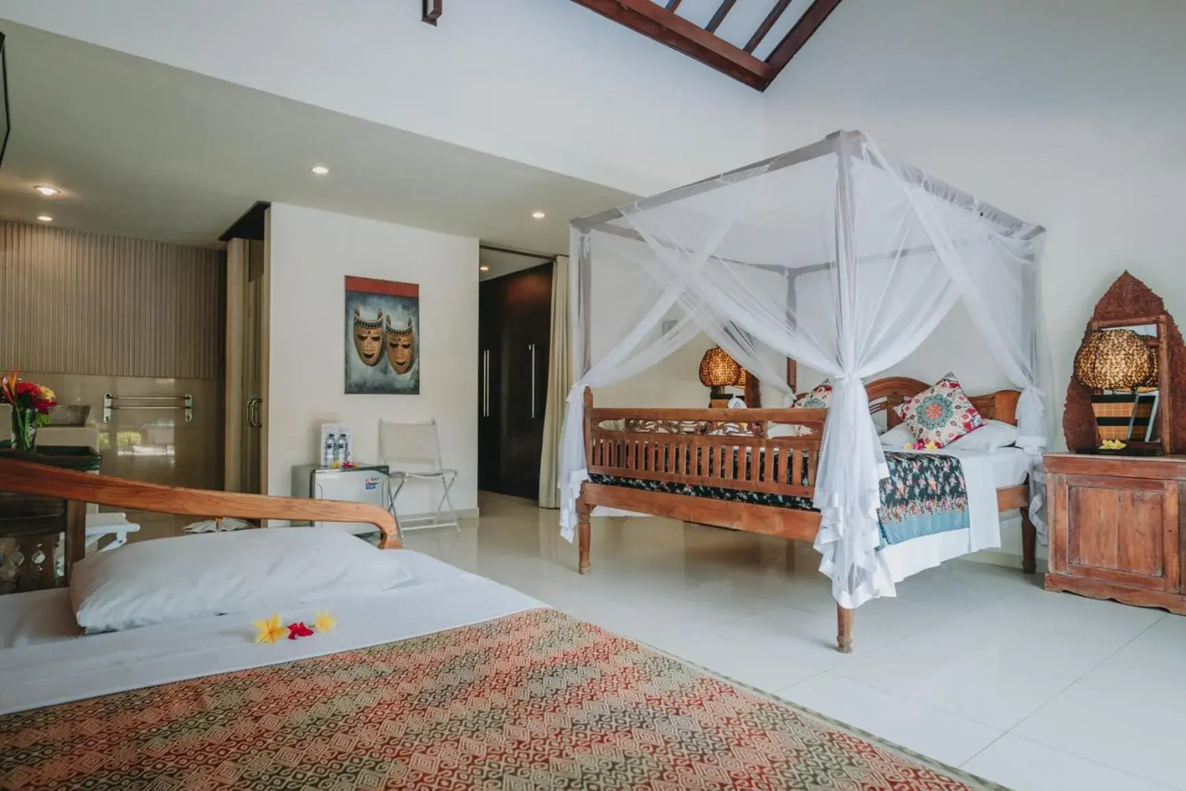 Bed in Frangipani Beach Hotel Bed in Frangipani Beach Hotel