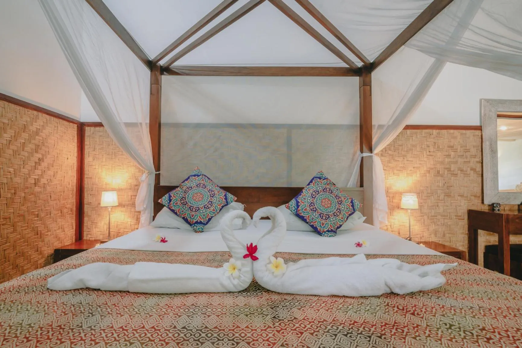 Bed in Frangipani Beach Hotel