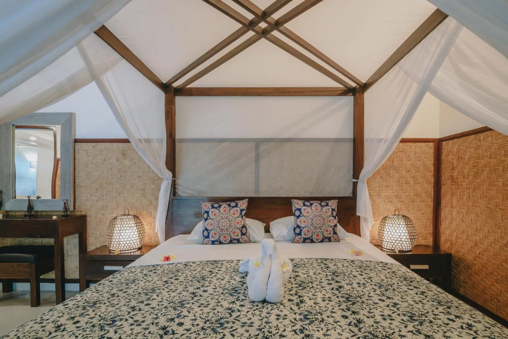 Bed in Frangipani Beach Hotel