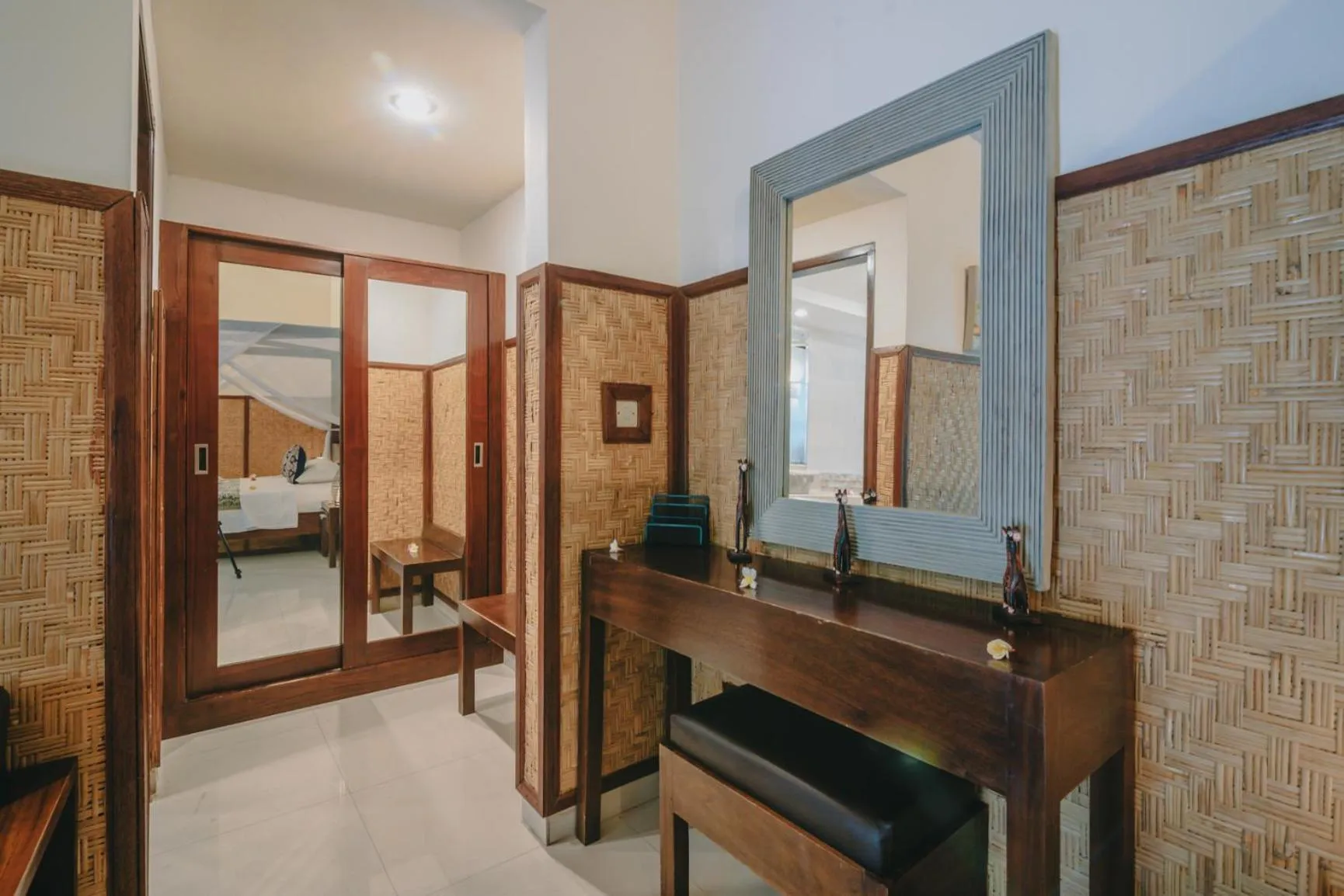 Bed in Frangipani Beach Hotel