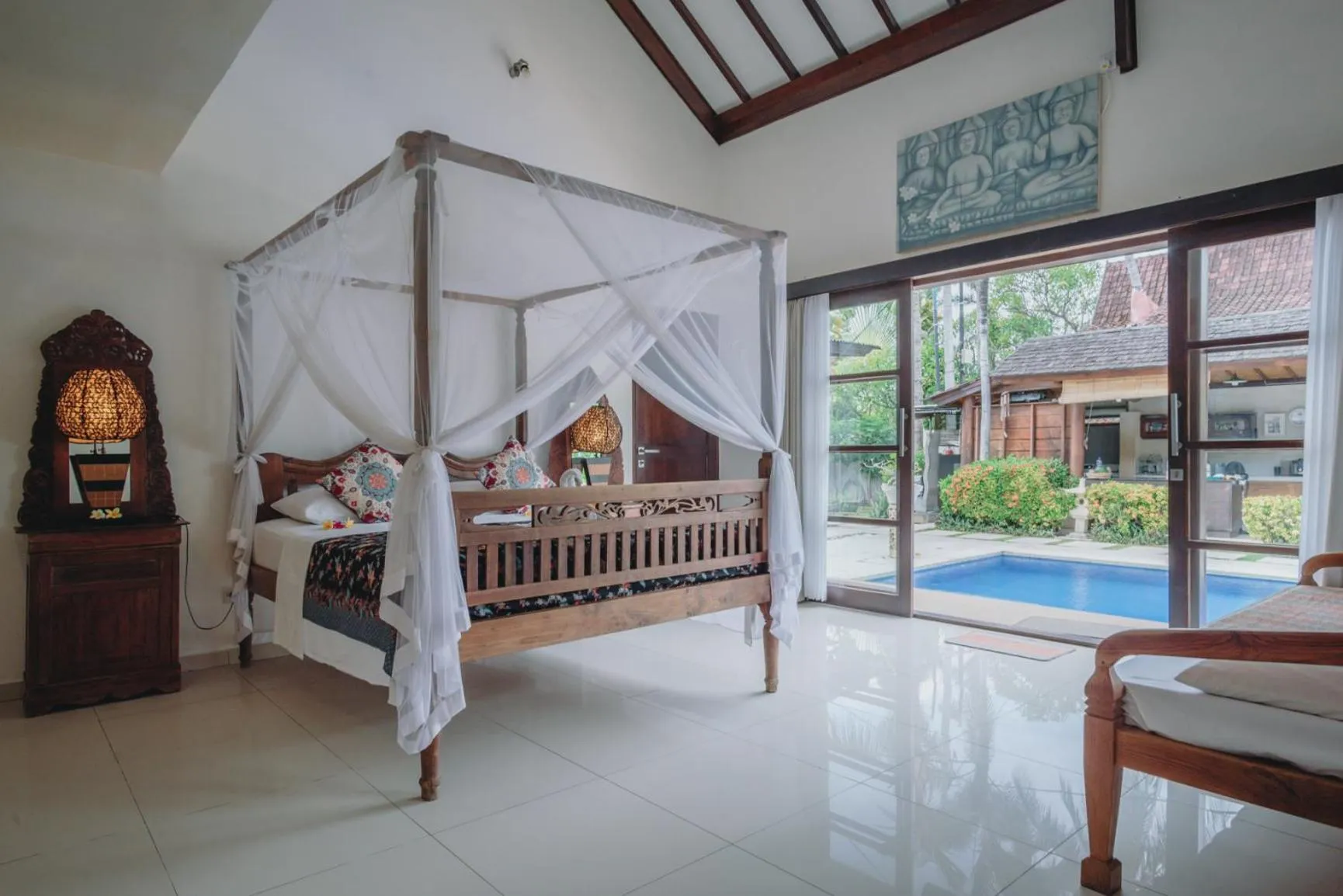 Bed in Frangipani Beach Hotel