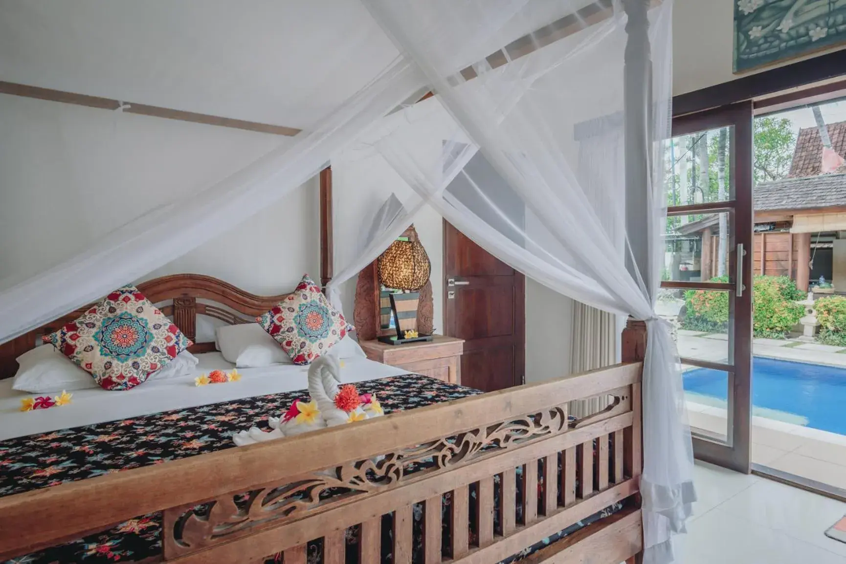 Bed in Frangipani Beach Hotel Bed in Frangipani Beach Hotel