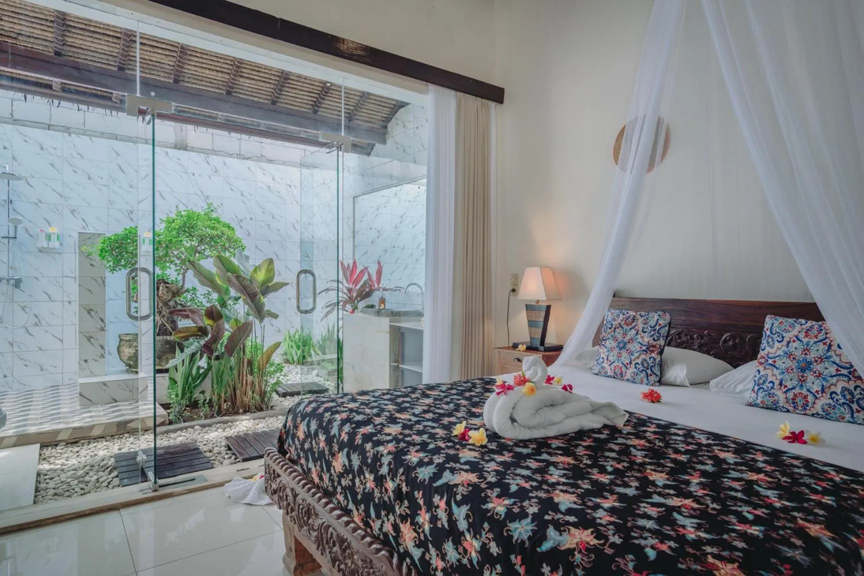 Bed in Frangipani Beach Hotel